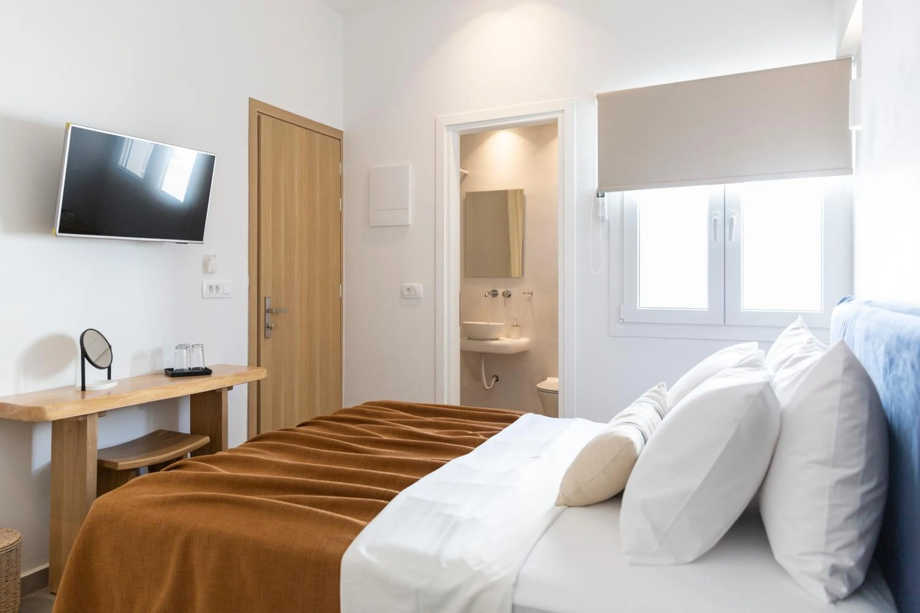 Bed in Asimina Hotel