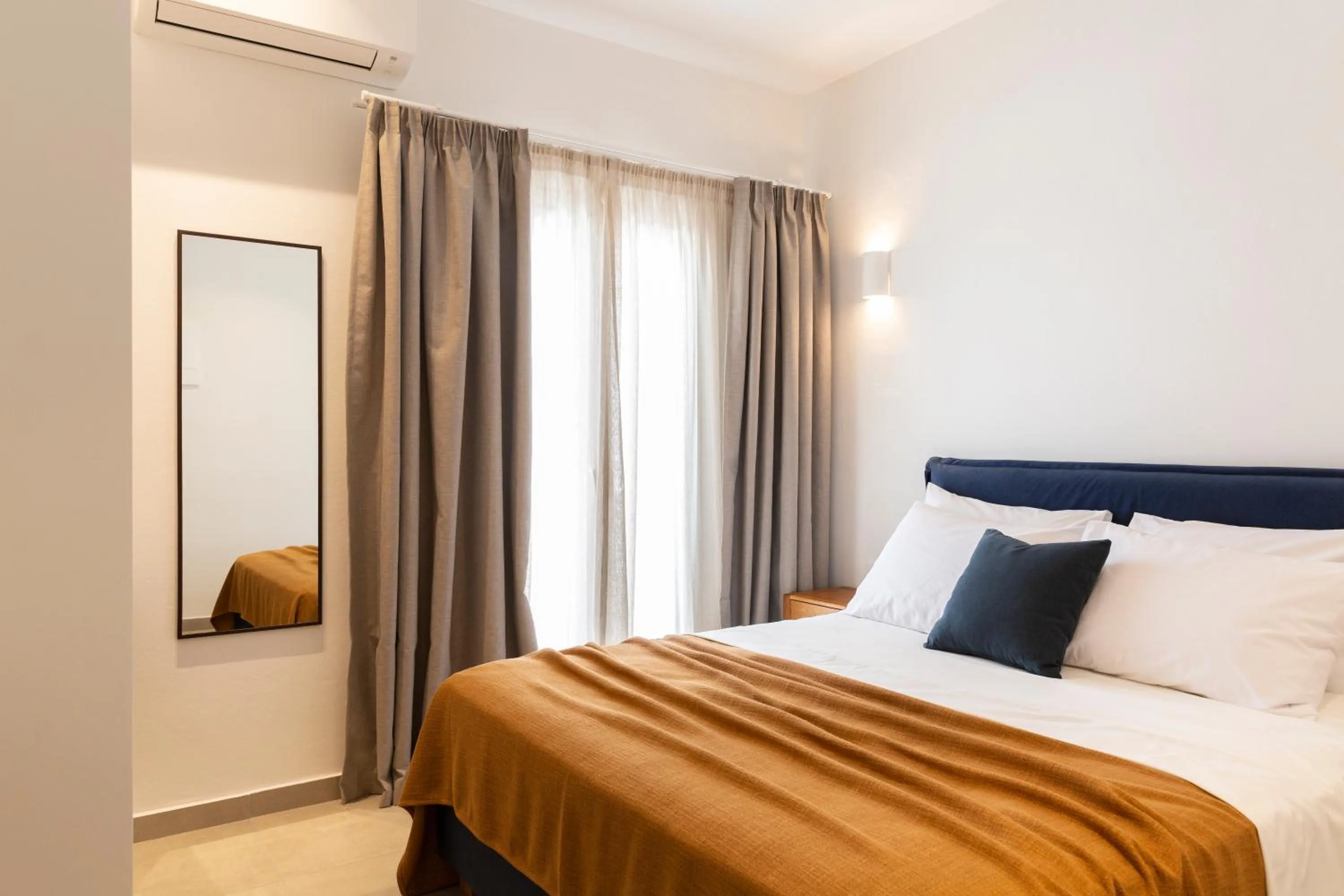 Bed in Asimina Hotel