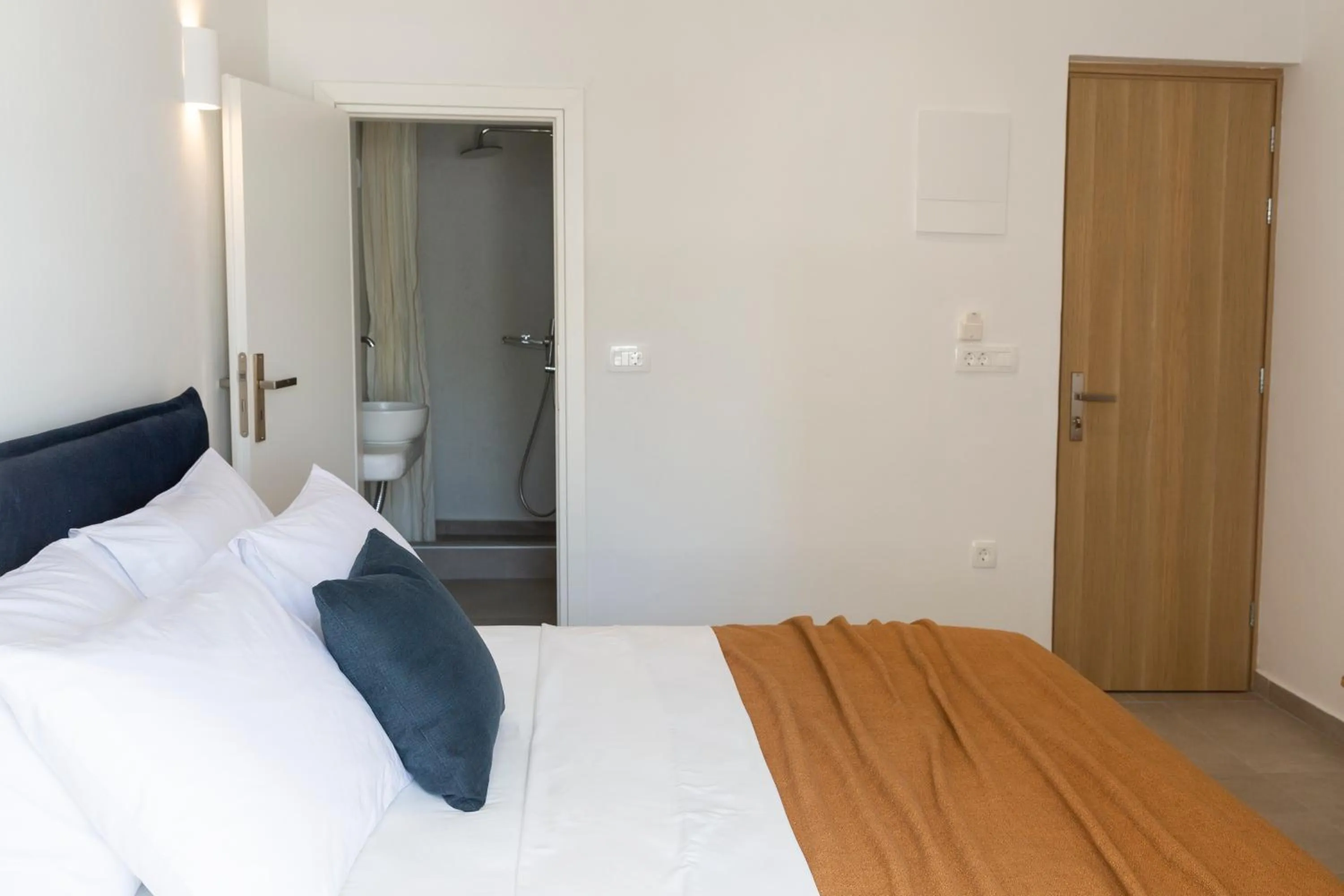 Bed in Asimina Hotel