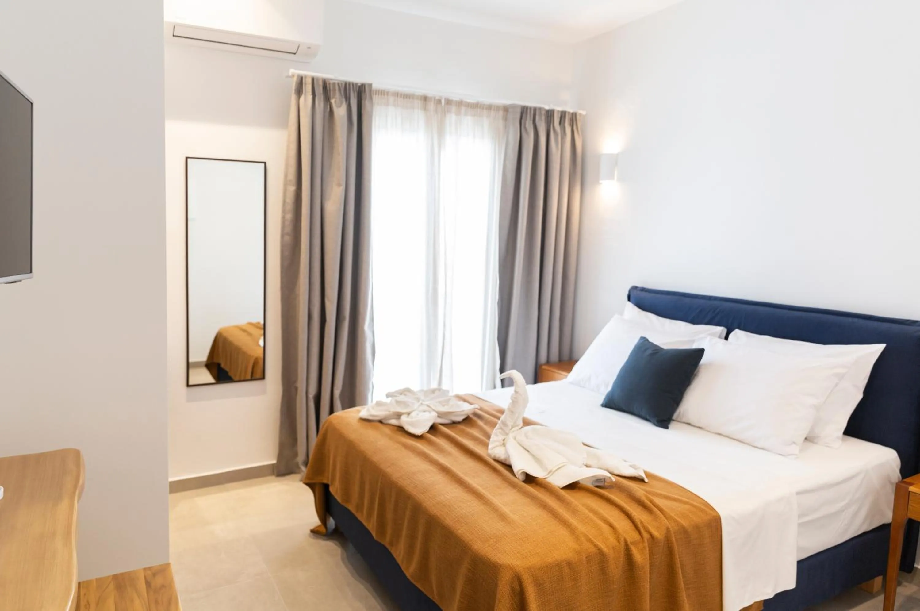 Bed in Asimina Hotel