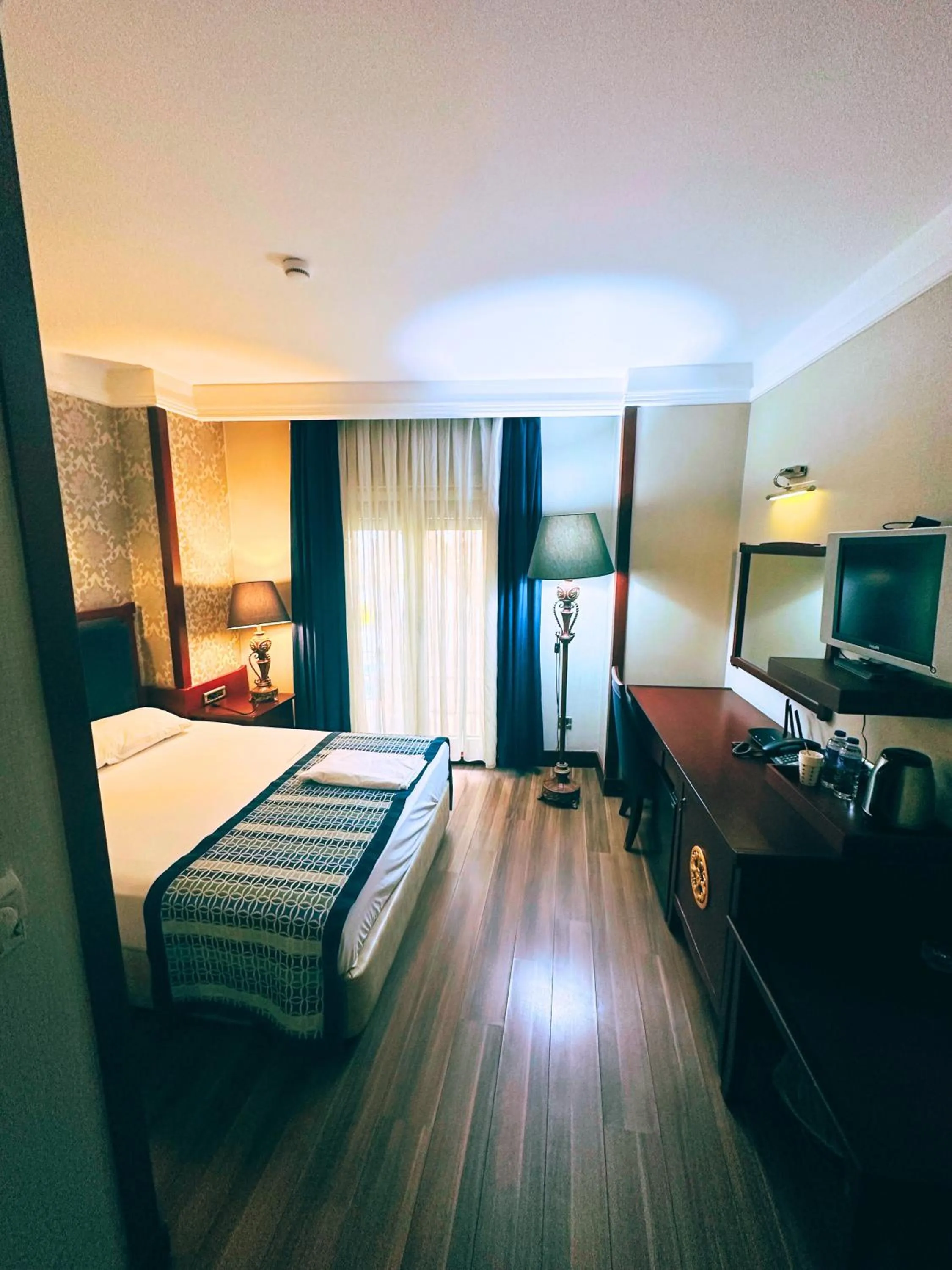 Bed in Boutique Princess Hotel