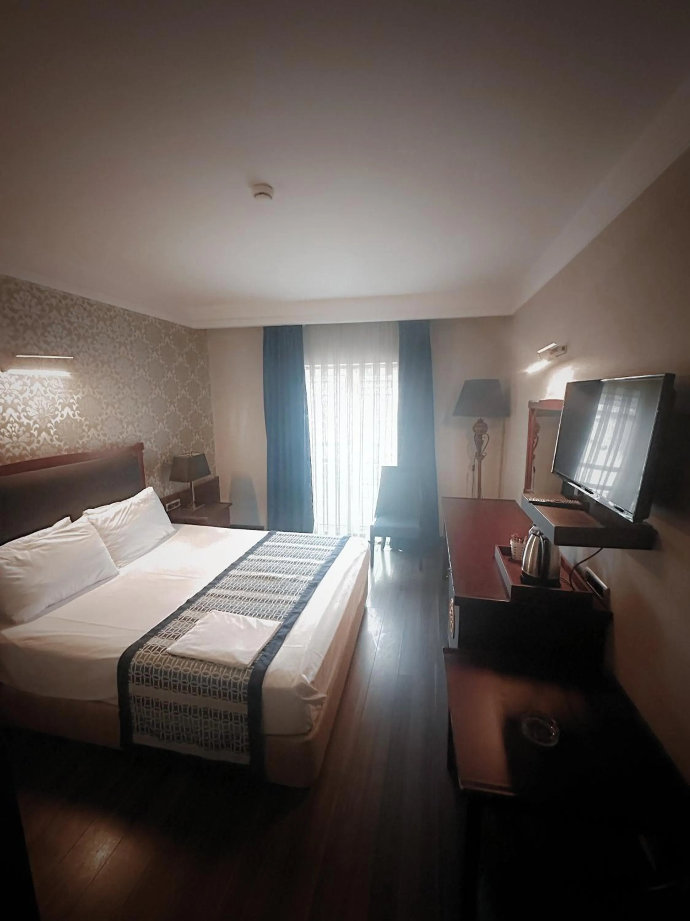 Bed in Boutique Princess Hotel