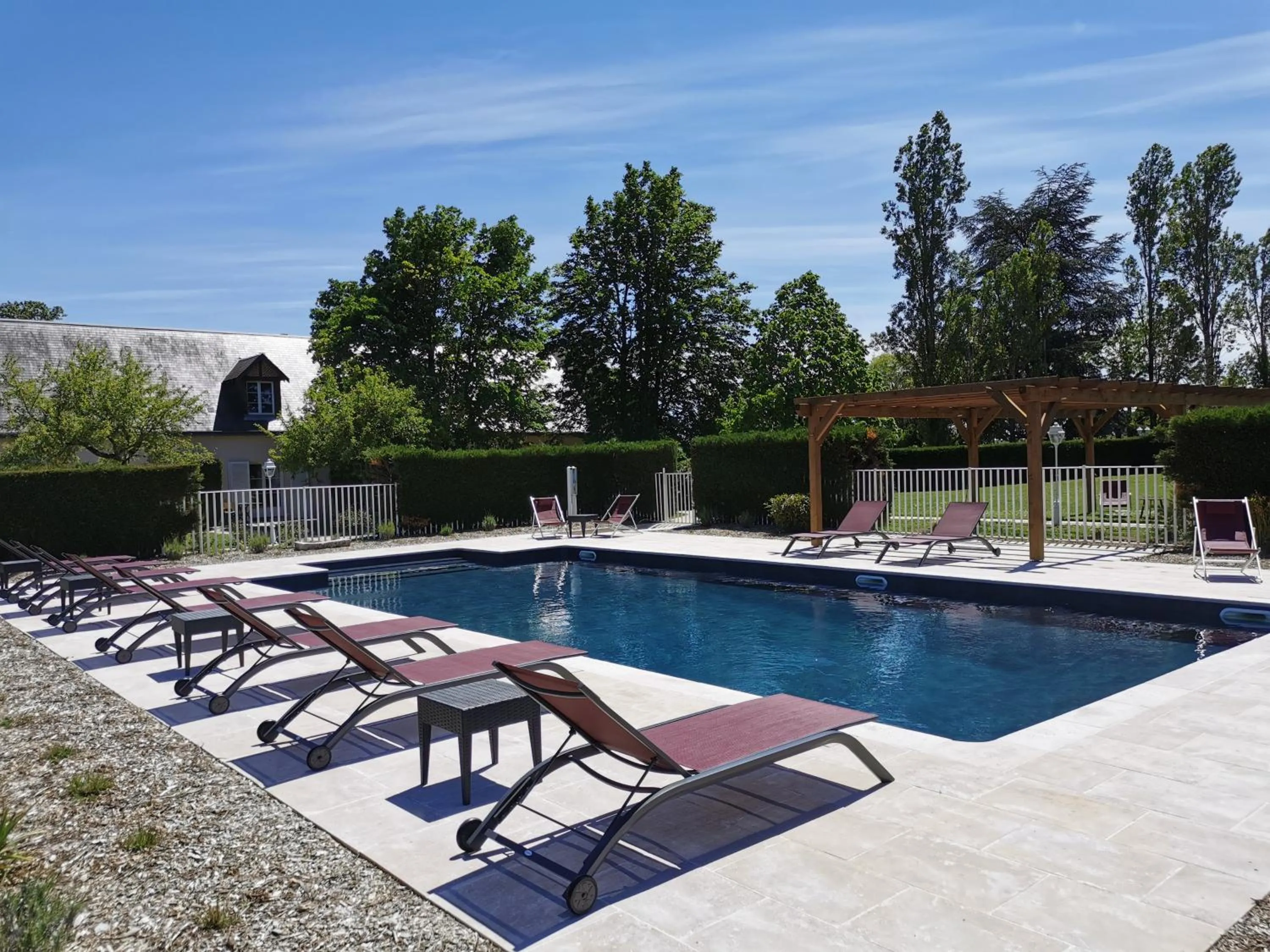 Swimming pool in Logis Le Fleuray