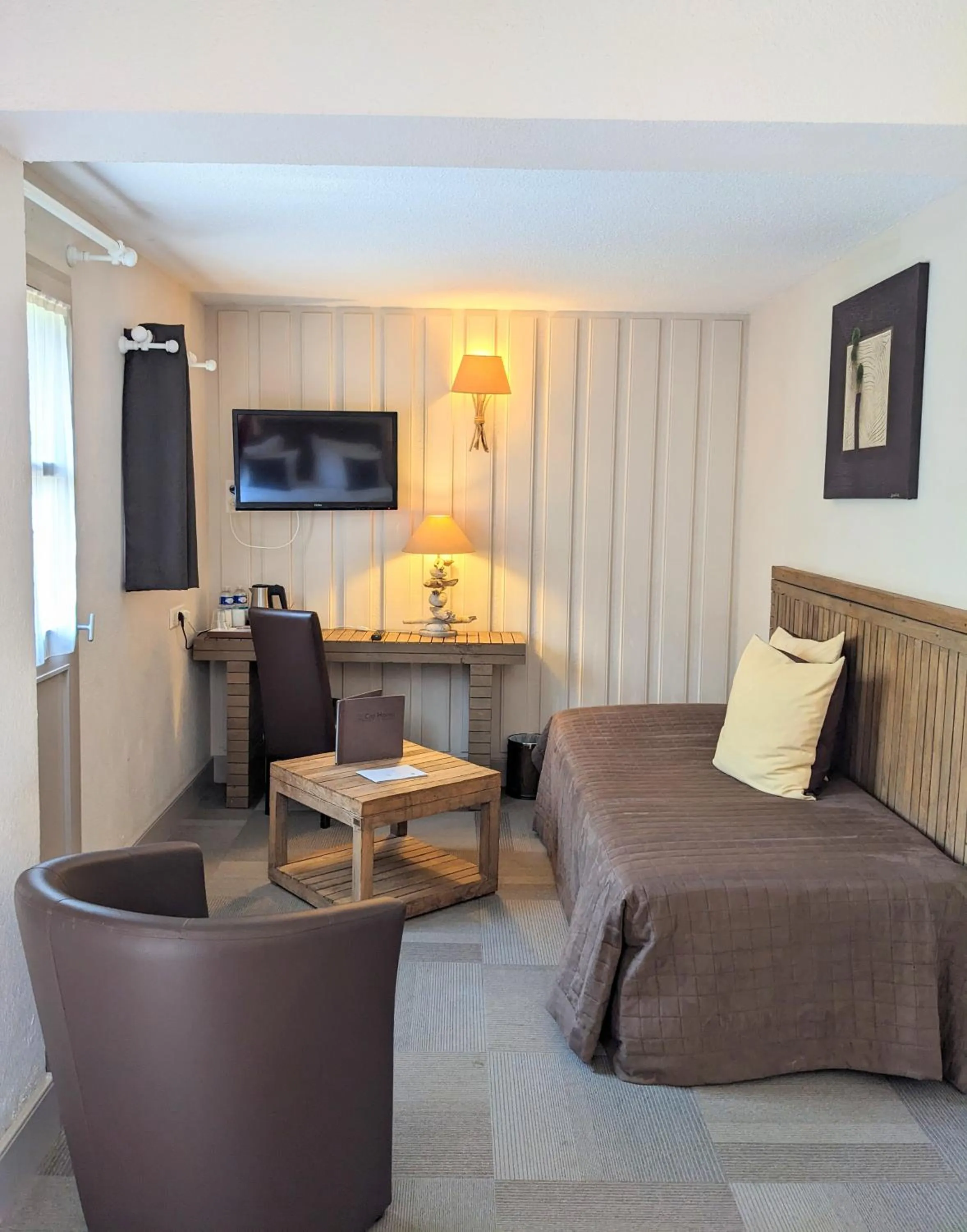 Seating area, Bed in Le Cap Hornu