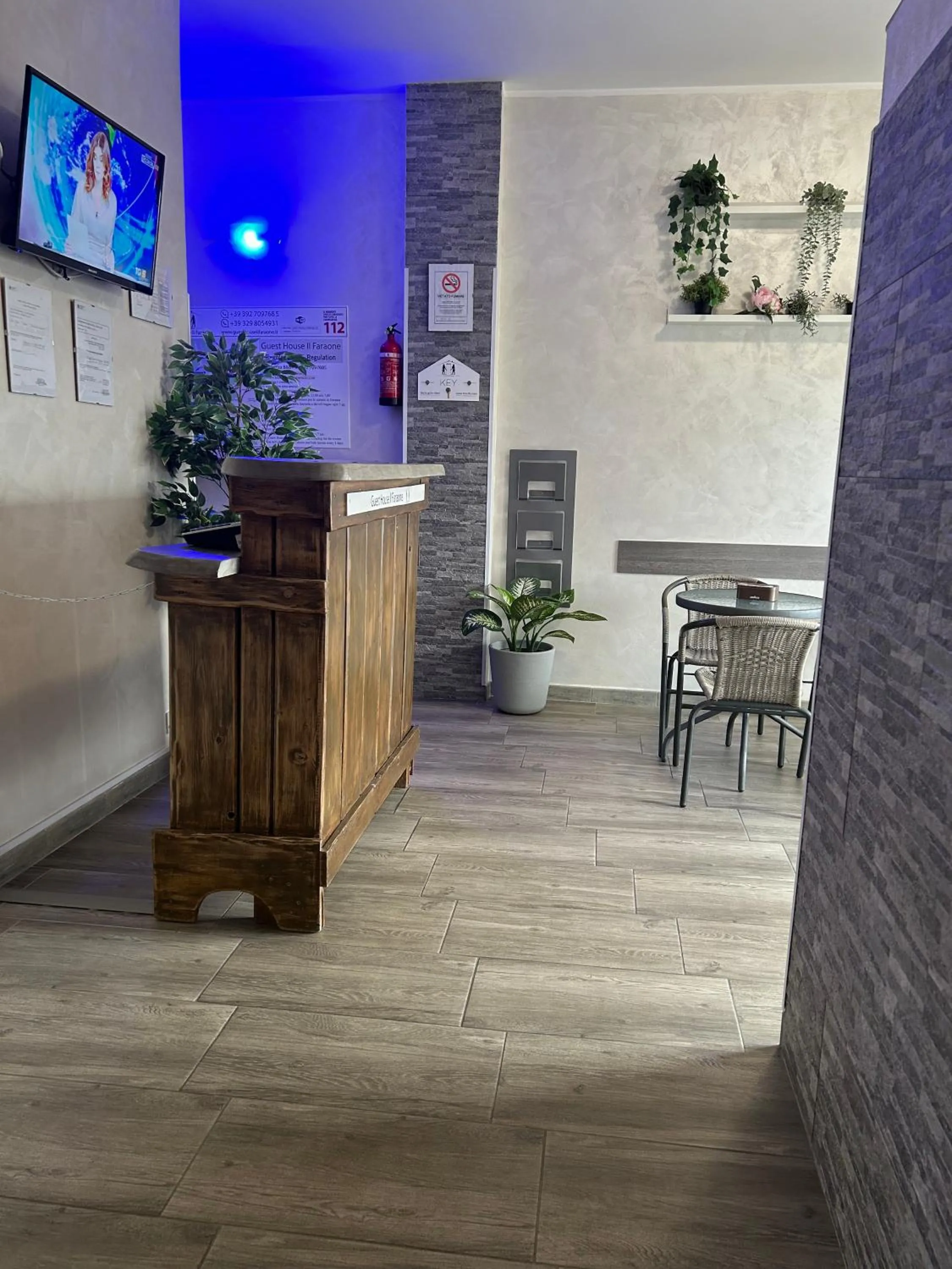 Communal lounge/ TV room in Guest House Il Faraone