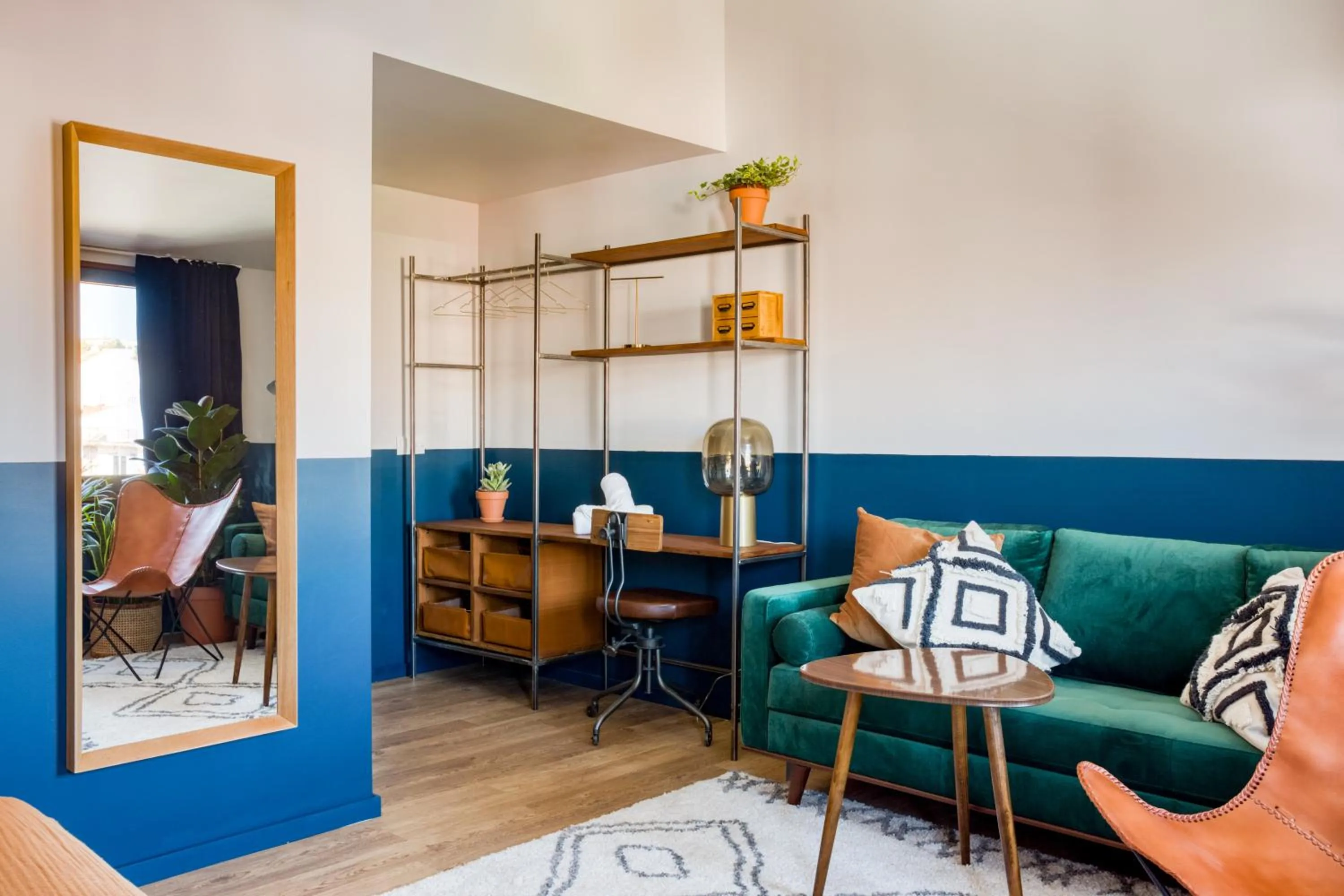 Seating area in Selina Secret Garden Lisbon by IKIGAI Global Hospitality