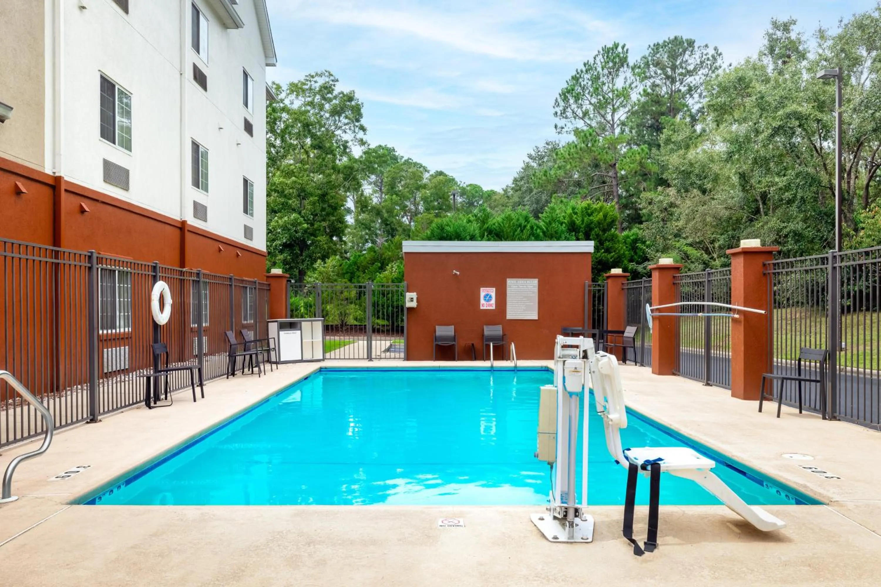 Swimming pool in Candlewood Suites Enterprise by IHG