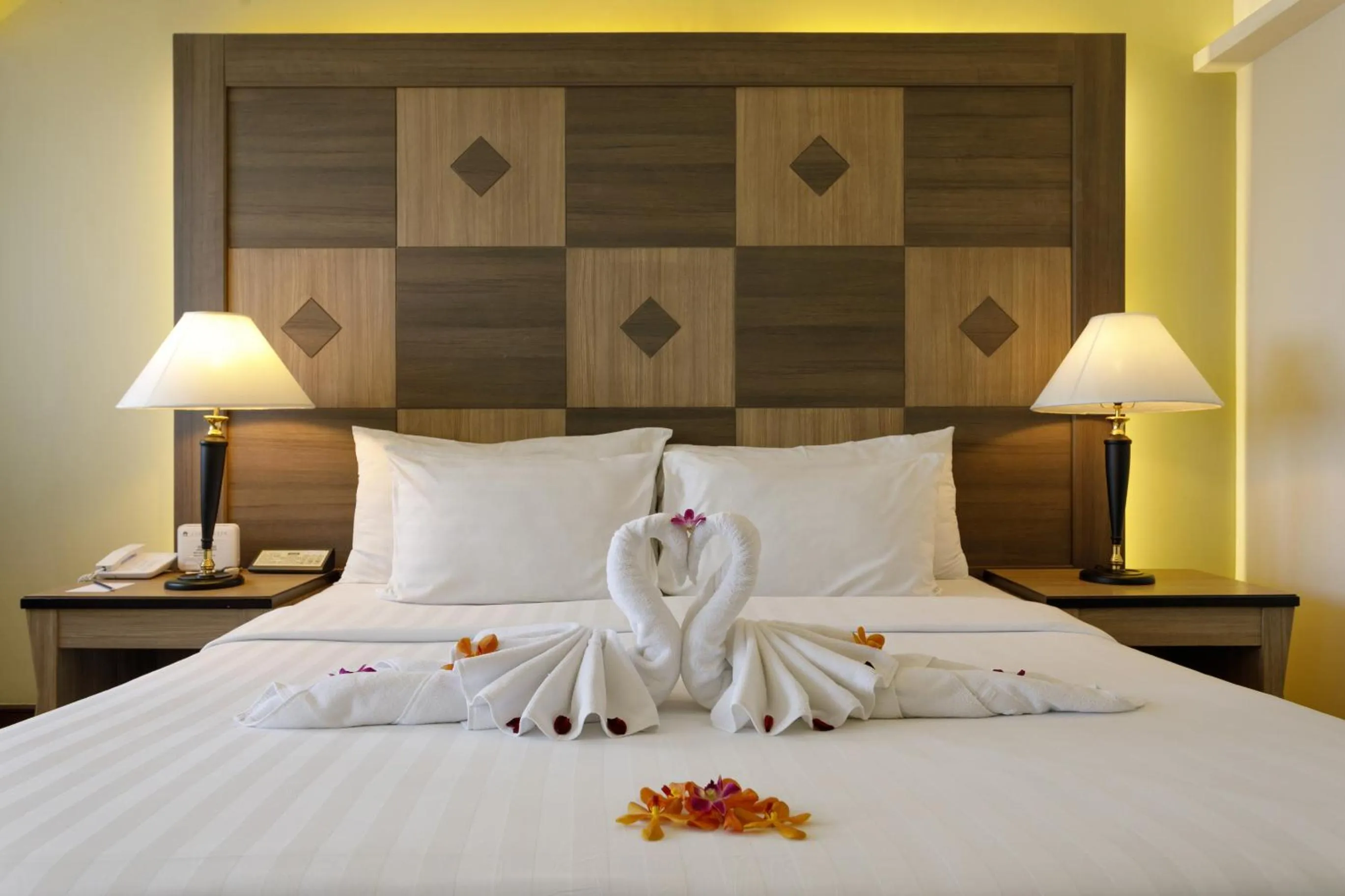 Bed in Amora Thapae Hotel Chiang Mai