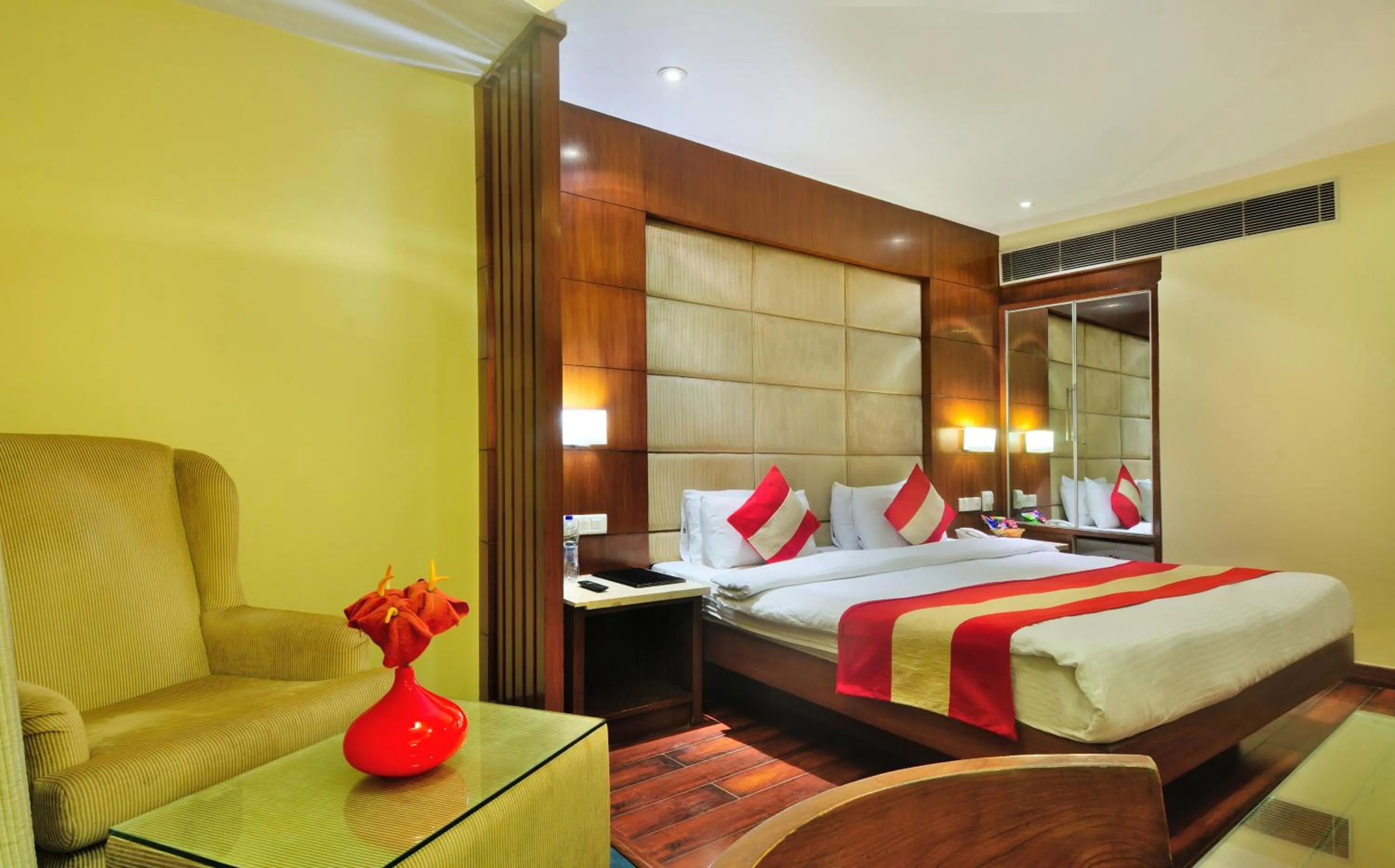 Photo of the whole room, Bed in Hotel Aura - New Delhi Railway Station