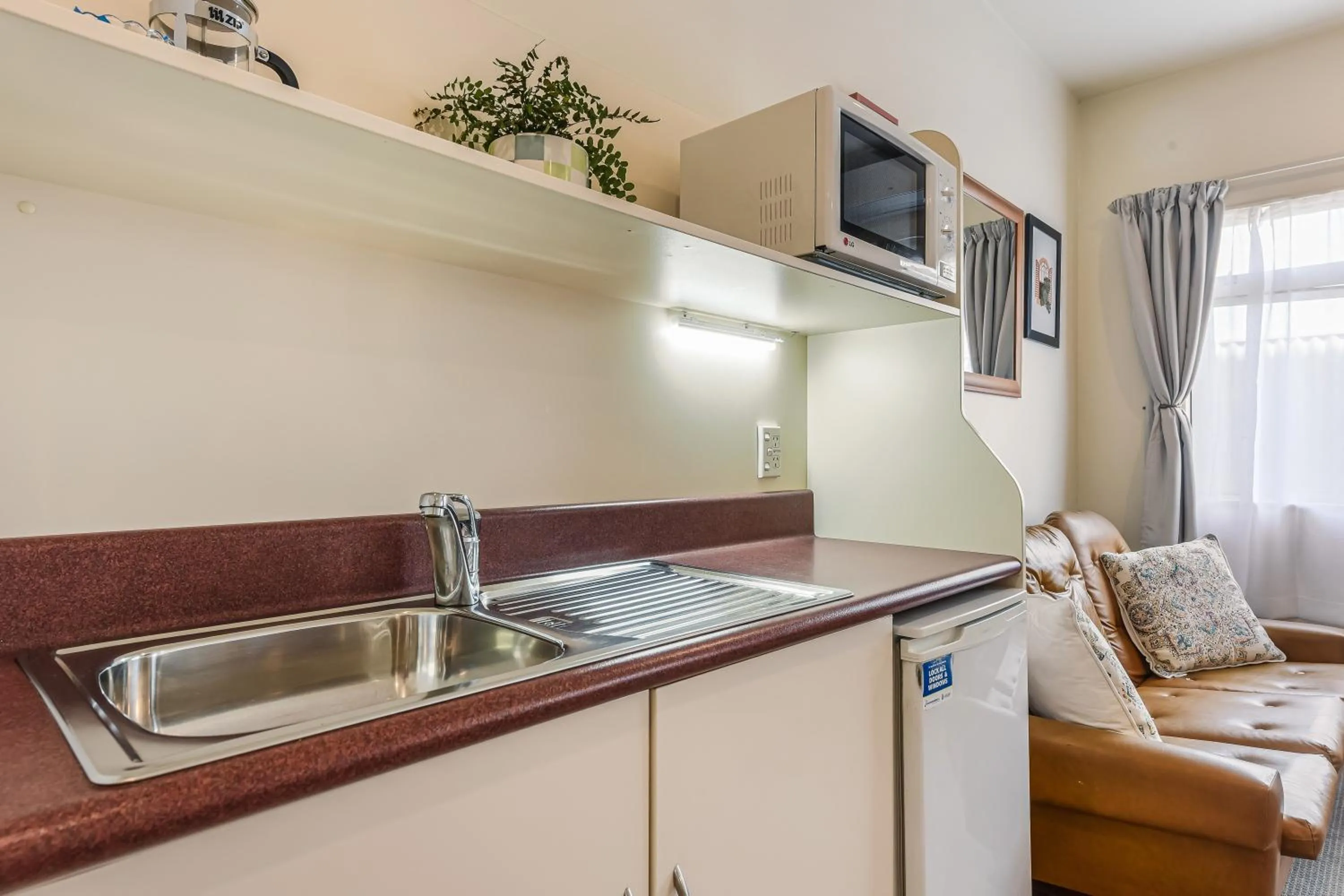 Kitchen or kitchenette in Boutique Motel