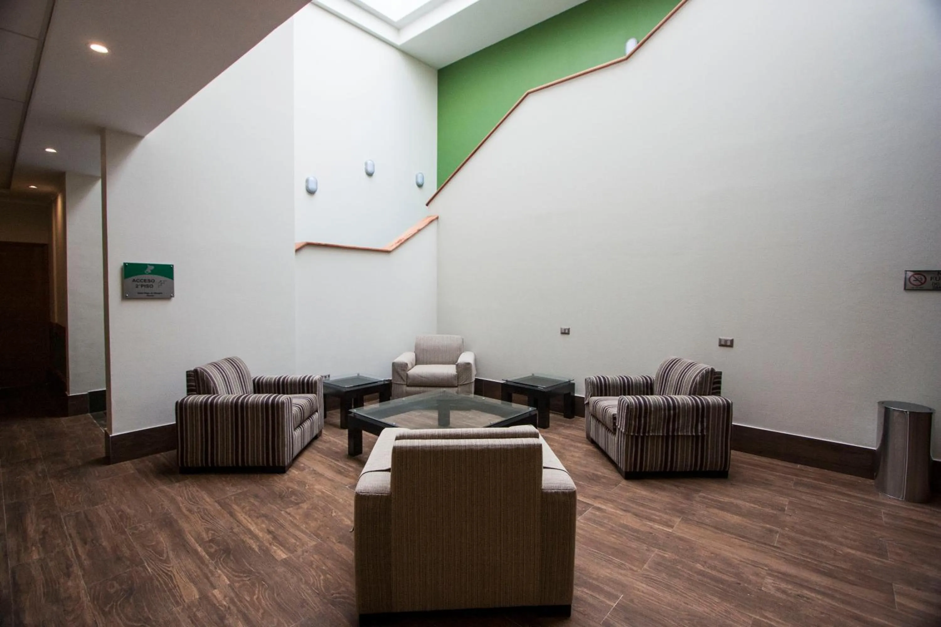 Communal lounge/ TV room in Hotel Diego de Almagro Osorno