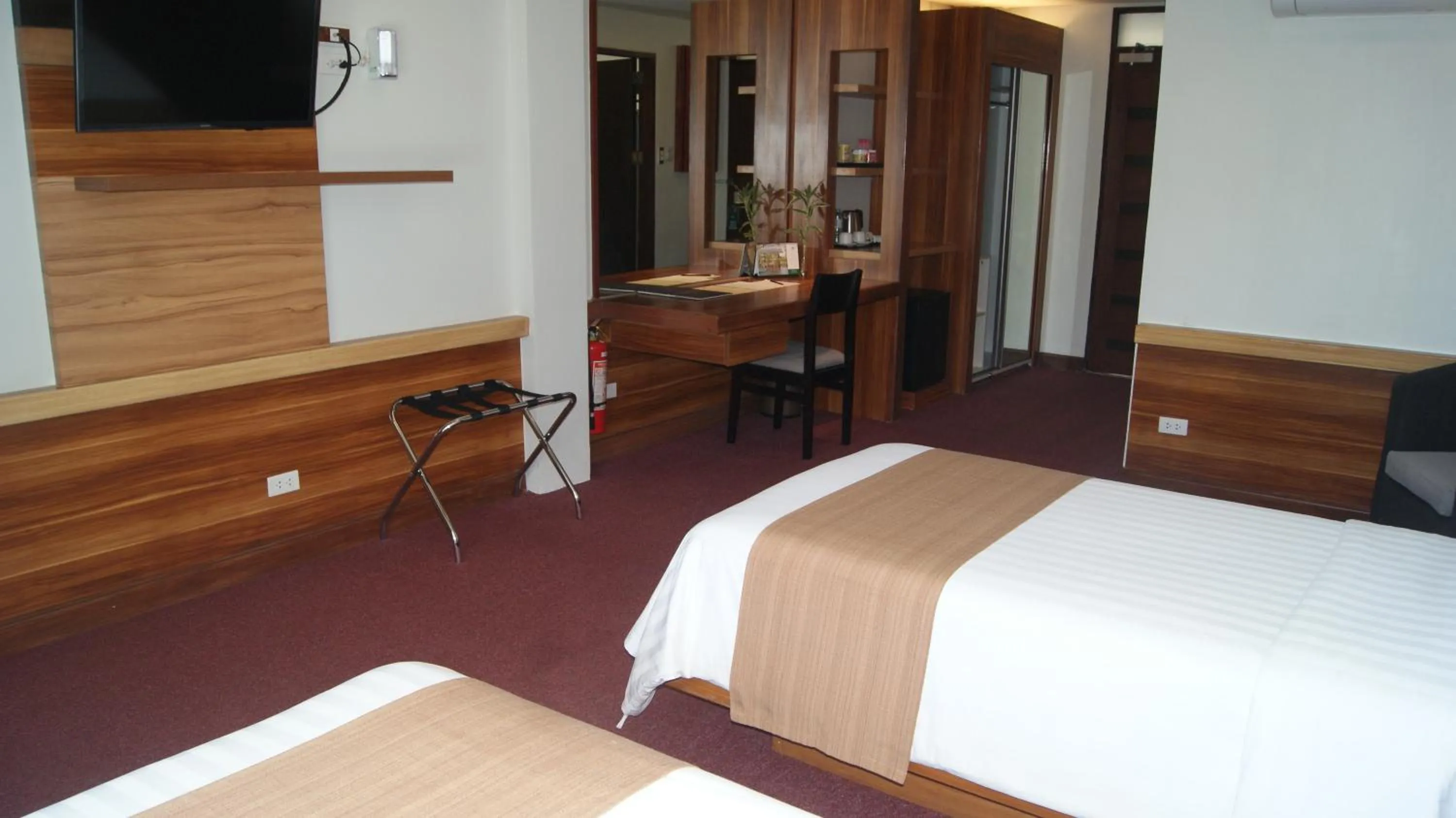 Bed in Grand Sierra Pines Baguio