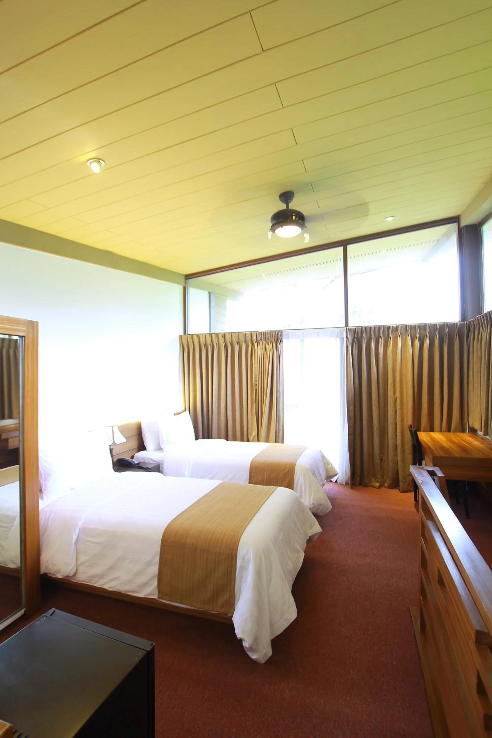 Photo of the whole room, Bed in Grand Sierra Pines Baguio