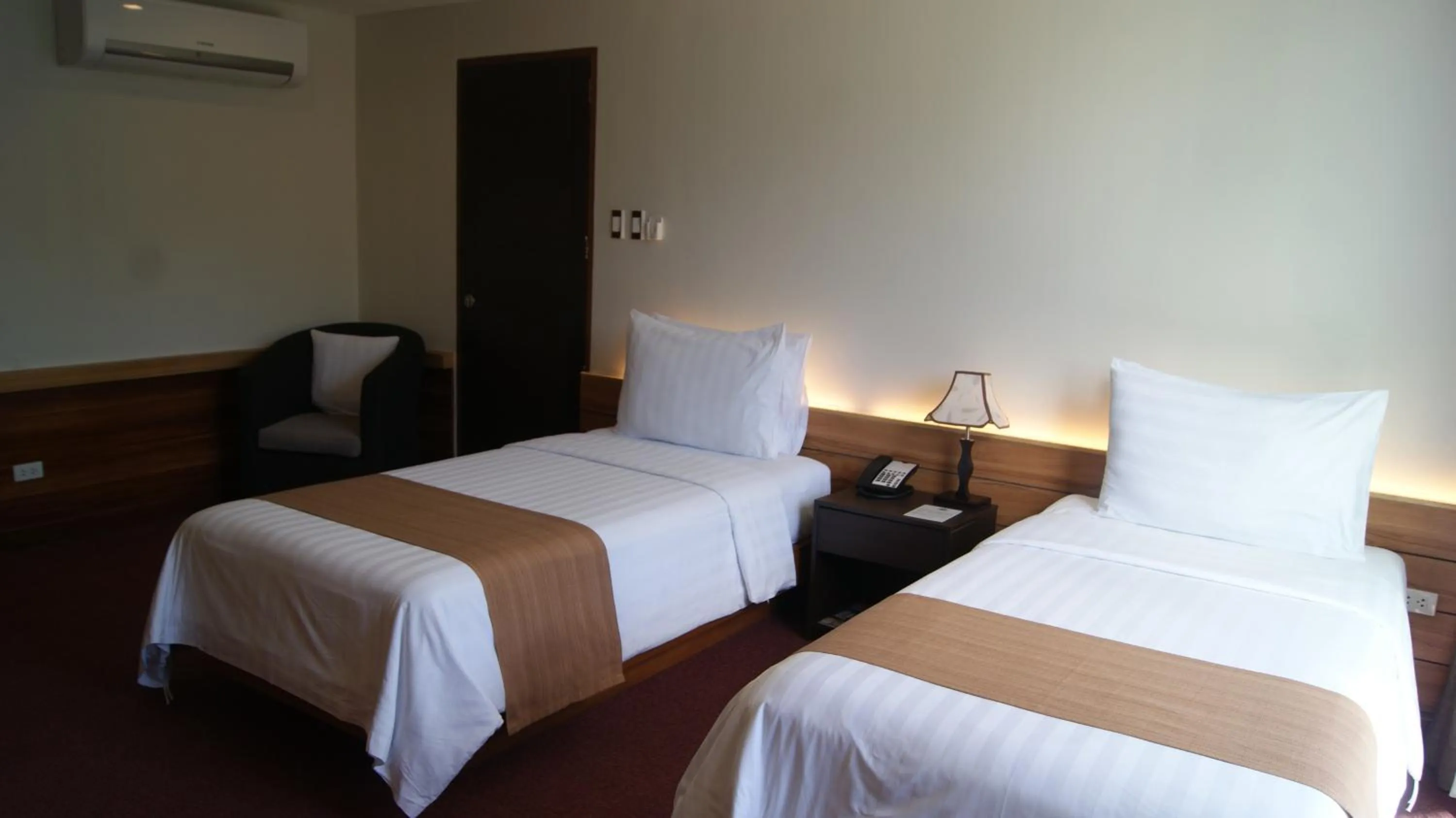 Bed in Grand Sierra Pines Baguio