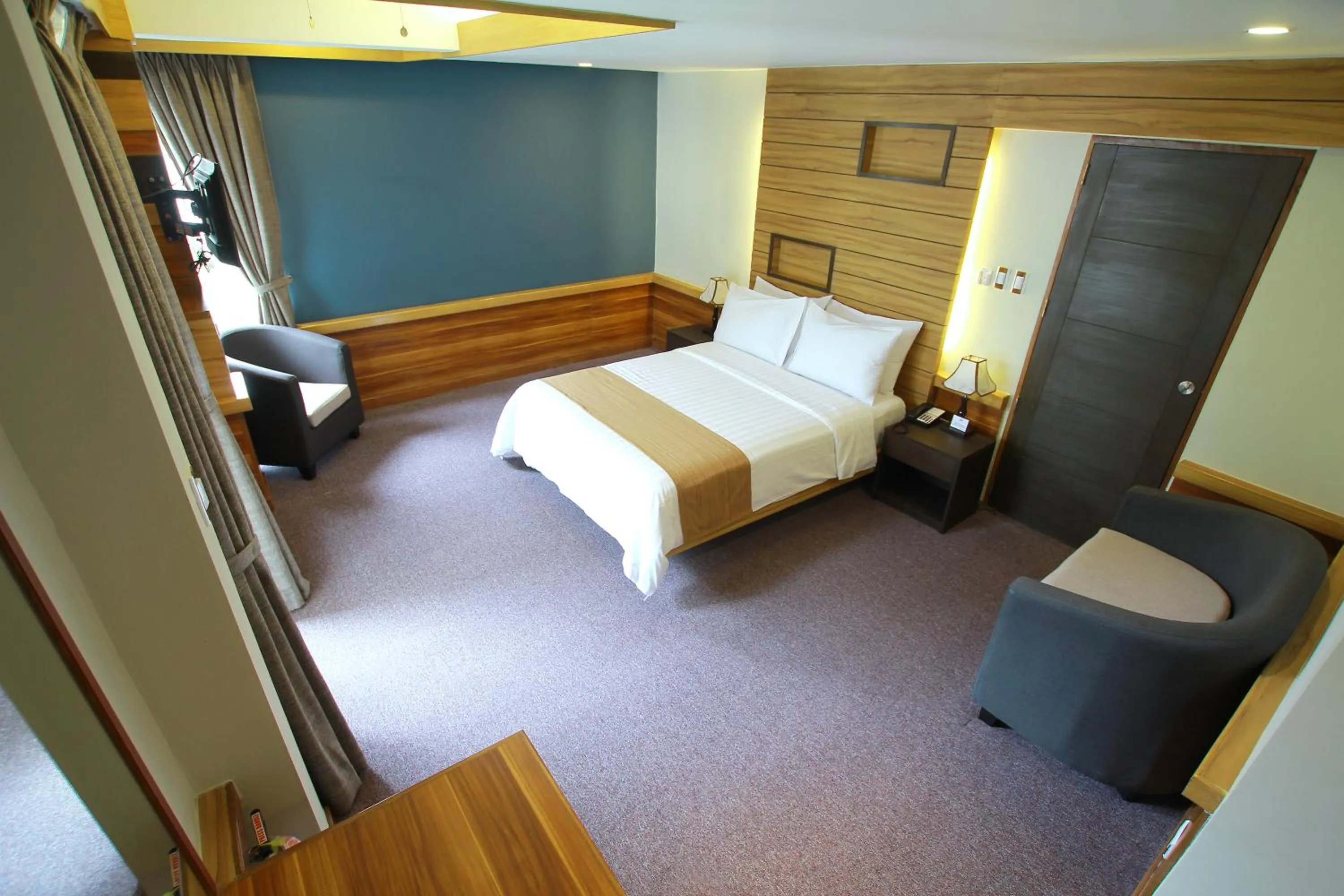 Photo of the whole room, Bed in Grand Sierra Pines Baguio