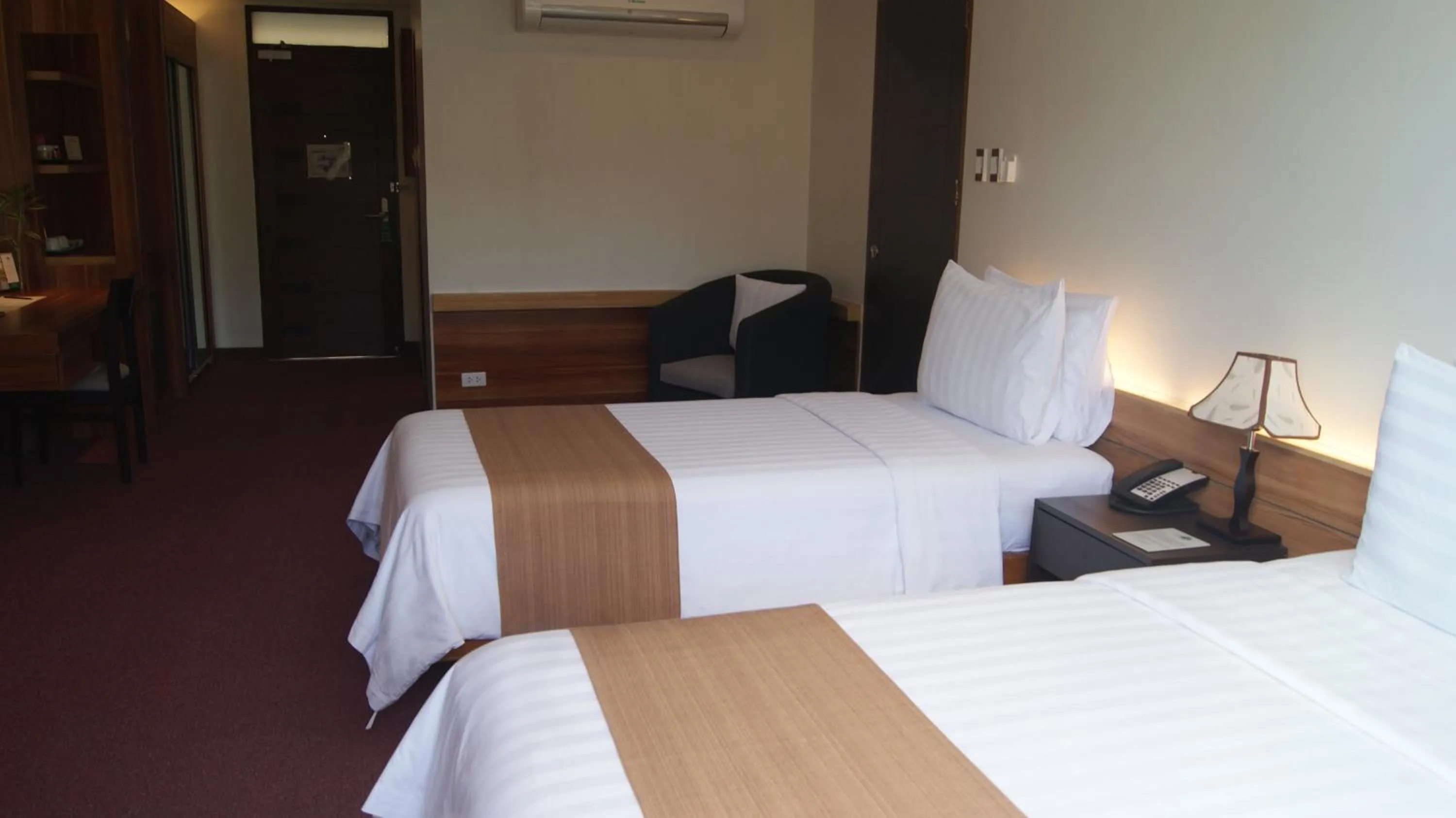 Bed in Grand Sierra Pines Baguio