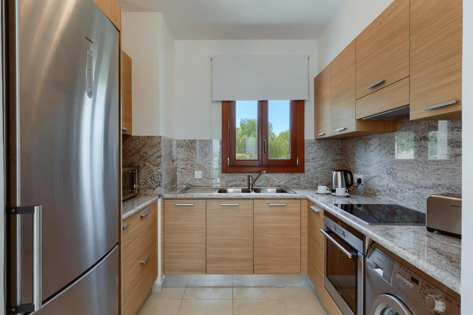 Kitchen or kitchenette in Aphrodite Hills Rentals - Apartments