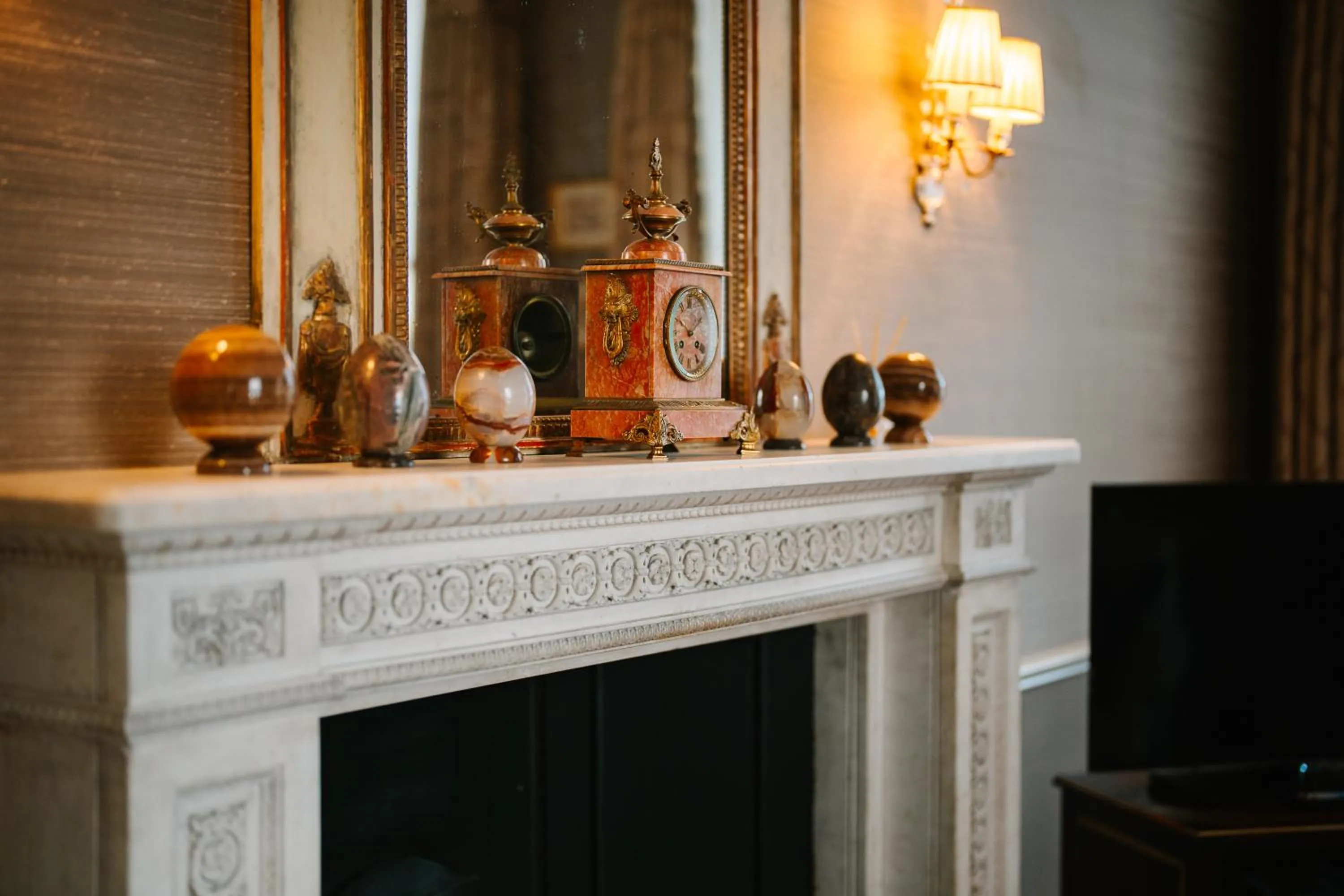 fireplace in Cliveden House - an Iconic Luxury Hotel