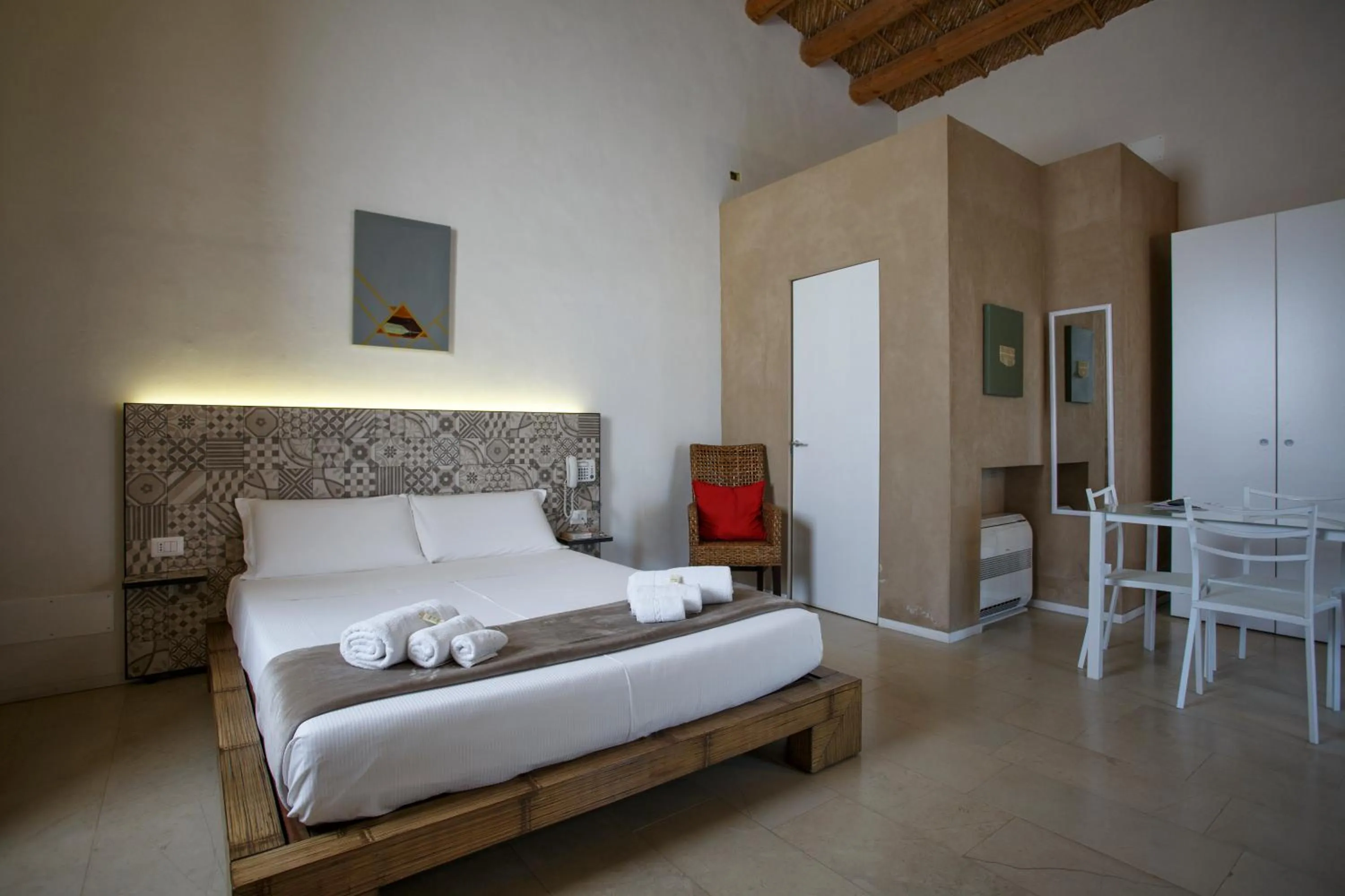 Bed in Stacci Rural Resort