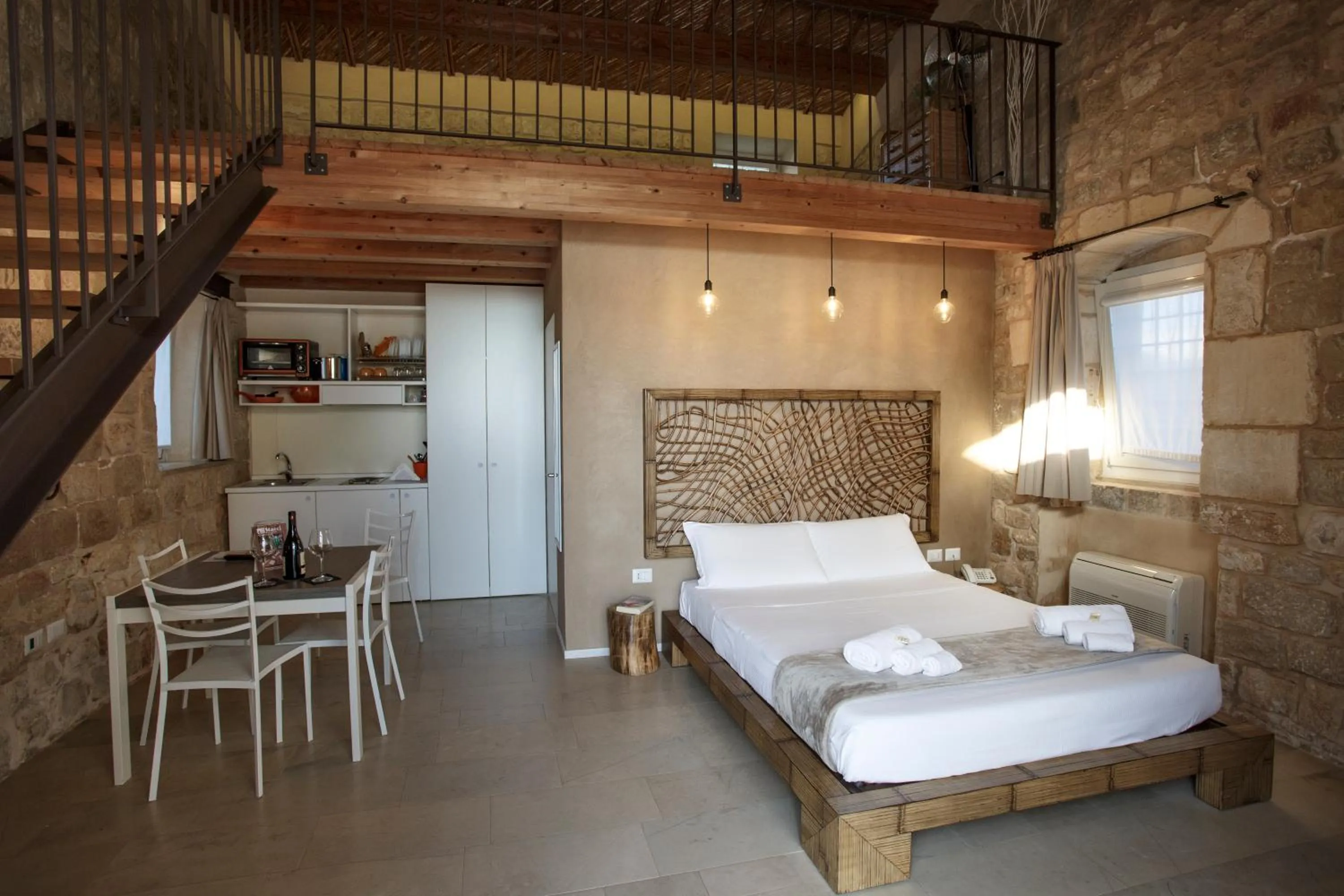 Kitchen or kitchenette, Bed in Stacci Rural Resort