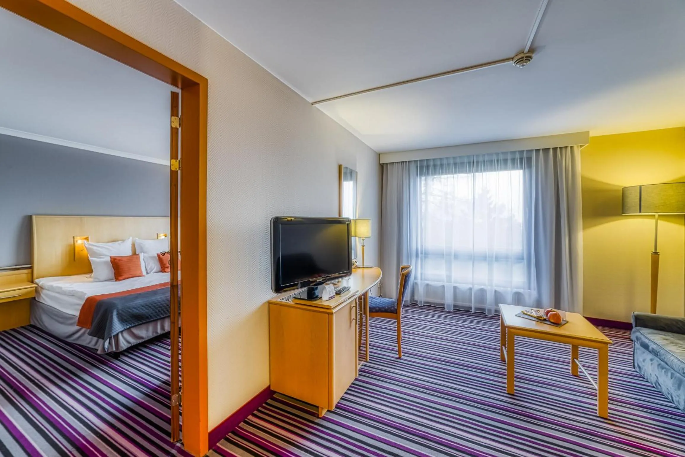 Seating area, Bed in Mercure Cieszyn