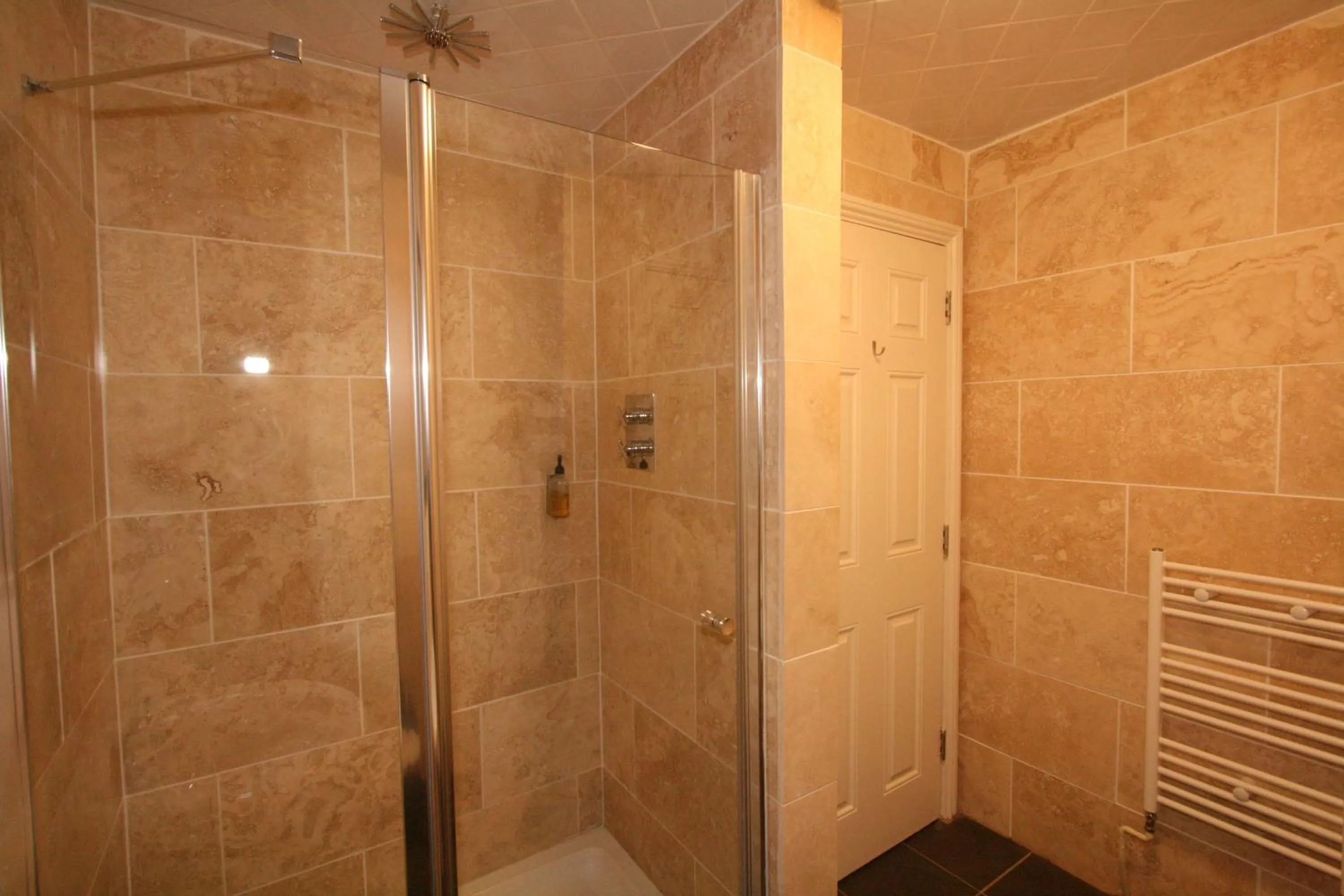 Bathroom in Central Studios Gloucester Road by RoomsBooked - Free Parking