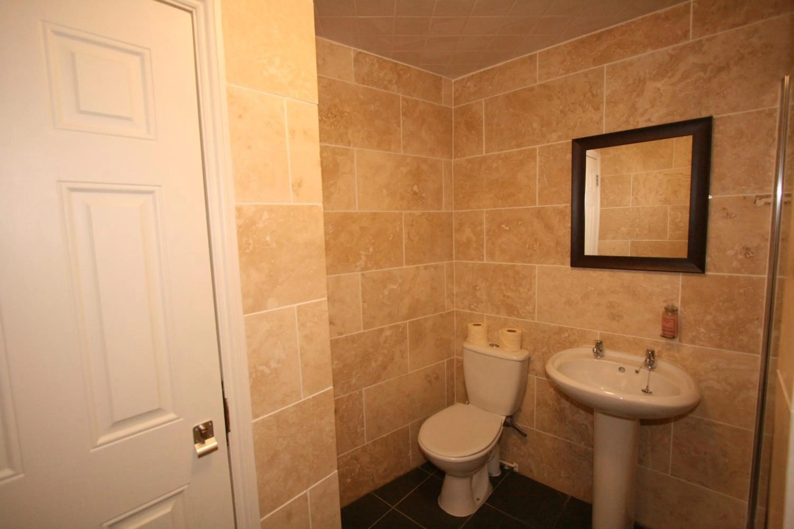 Bathroom in Central Studios Gloucester Road by RoomsBooked - Free Parking
