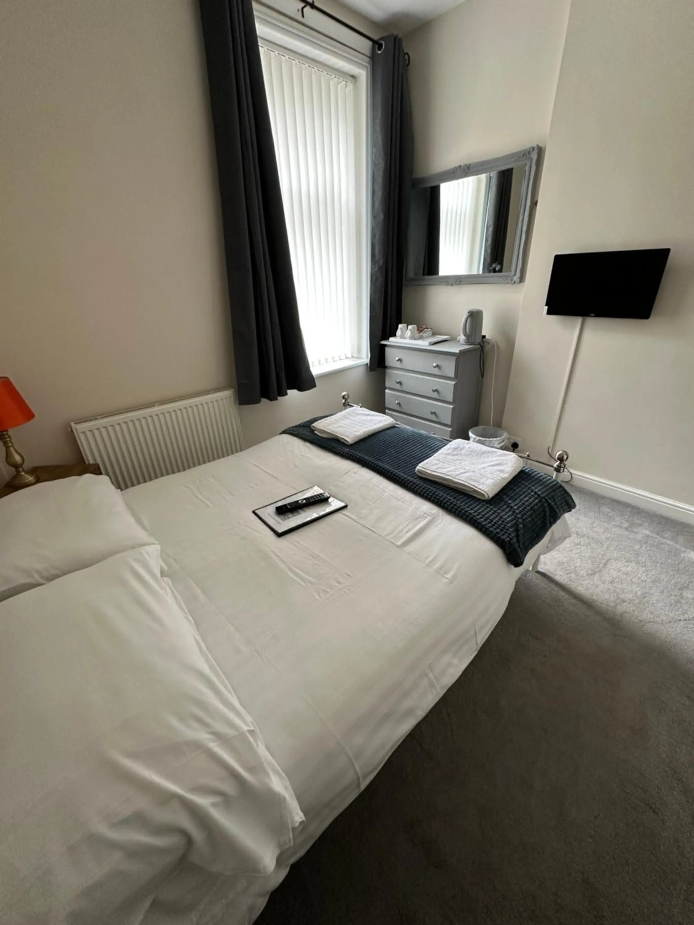 Bed in The Villa Hotel