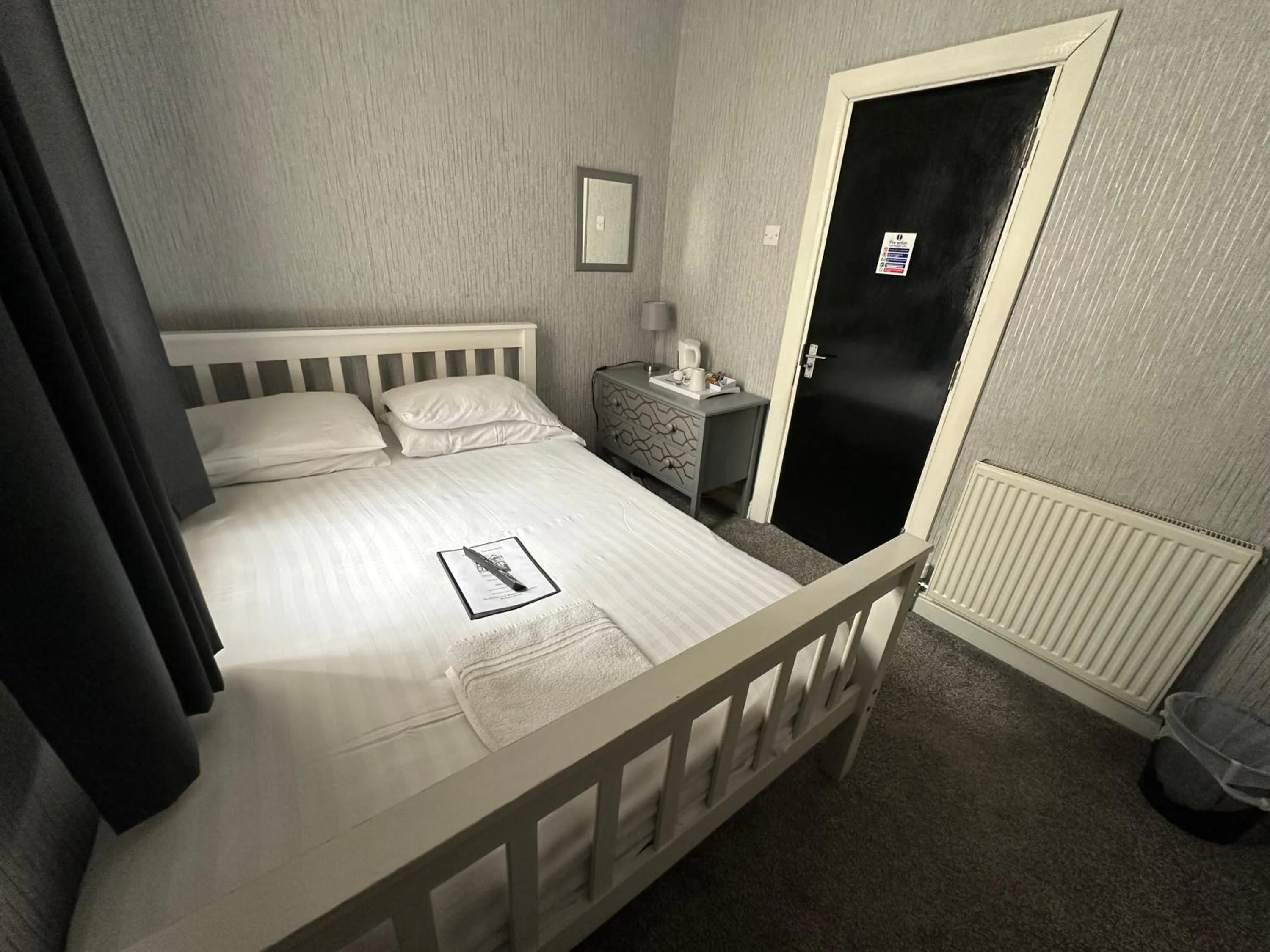 Bed in The Villa Hotel