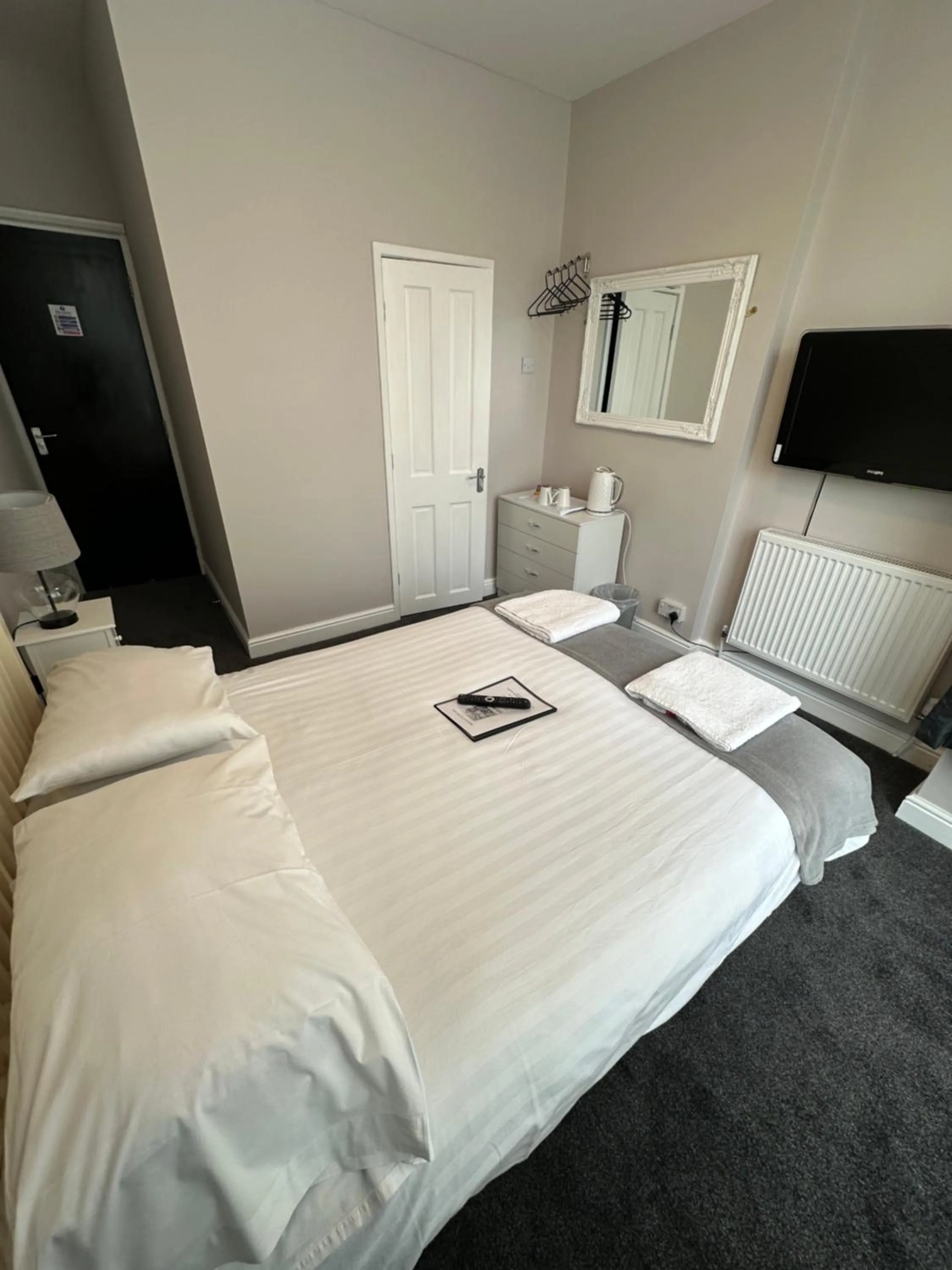 Bed in The Villa Hotel