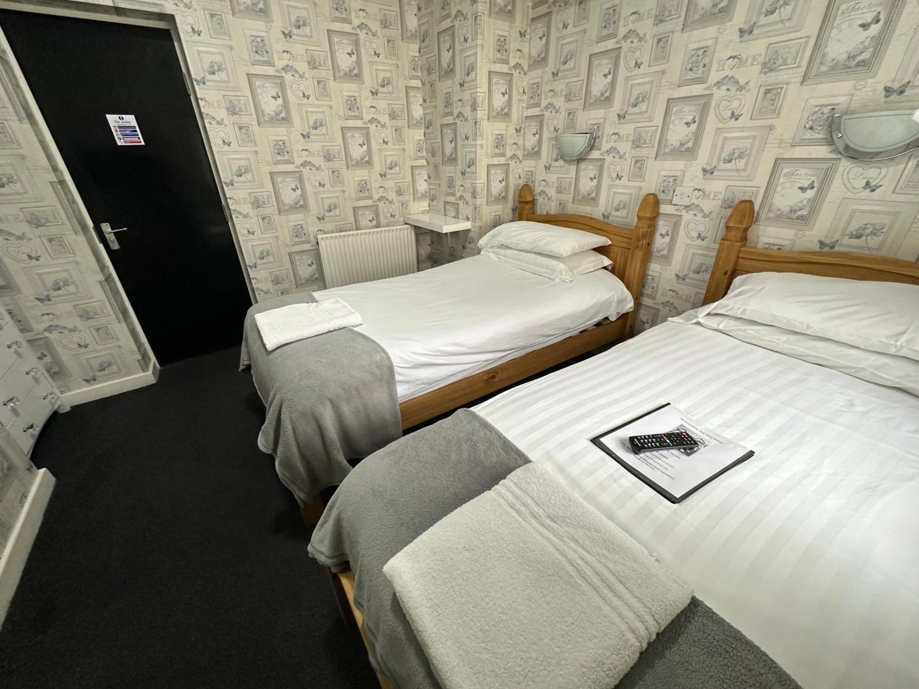 Bed in The Villa Hotel