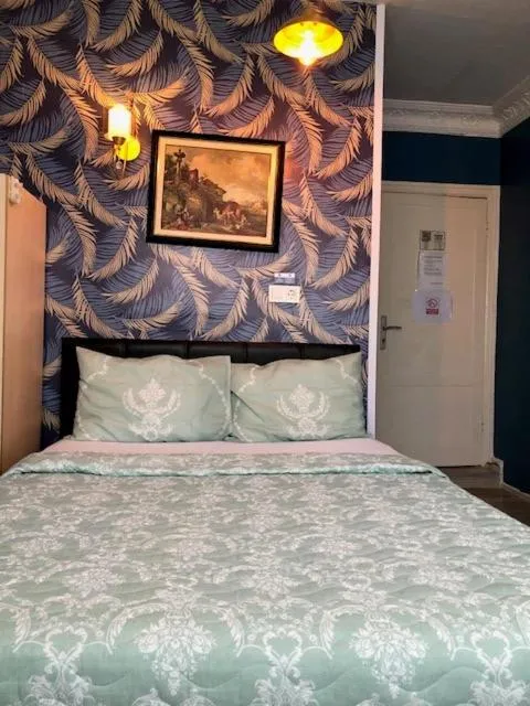 Bed in Ozdemir Pansiyon