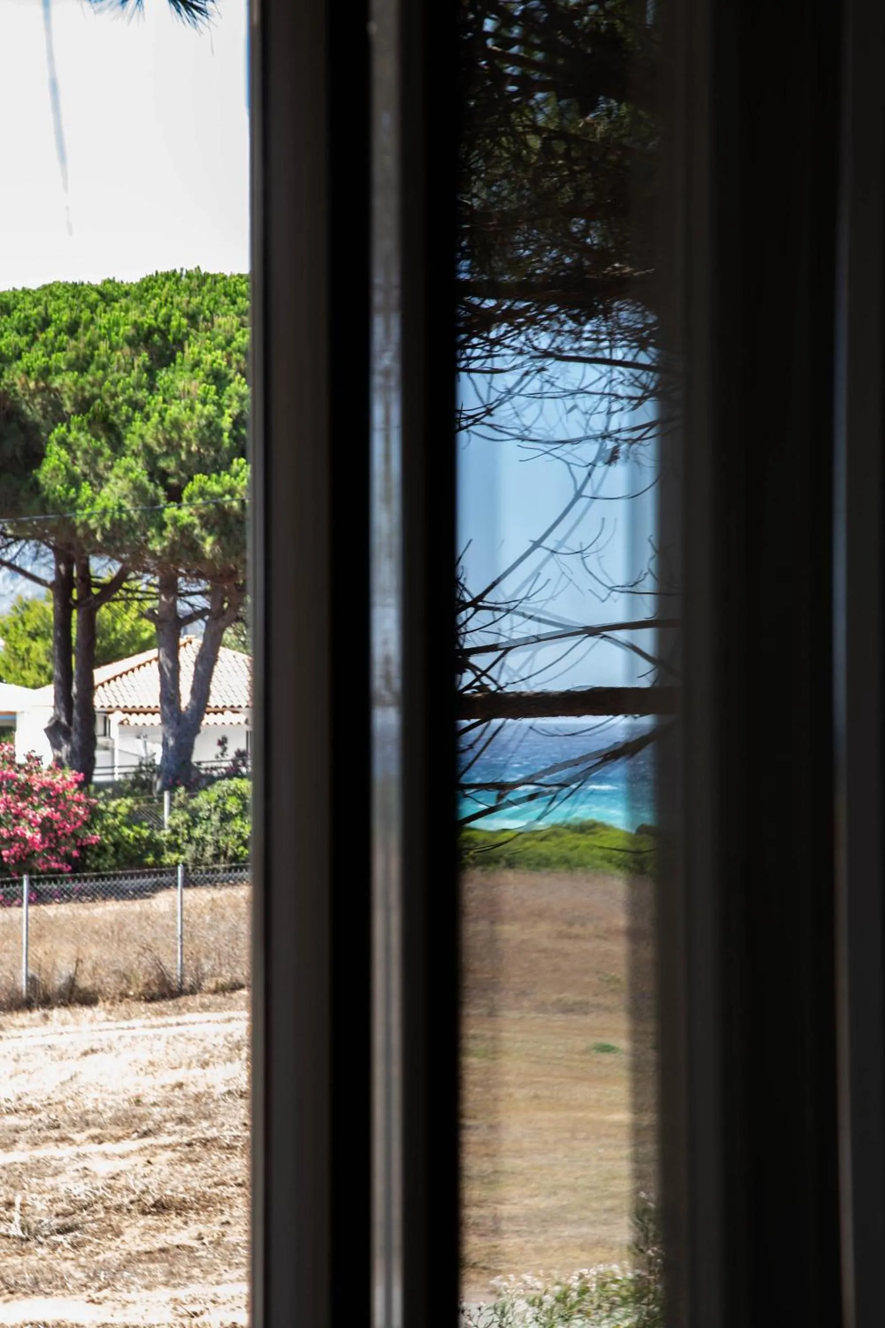 Garden in Romanos Beach Villas