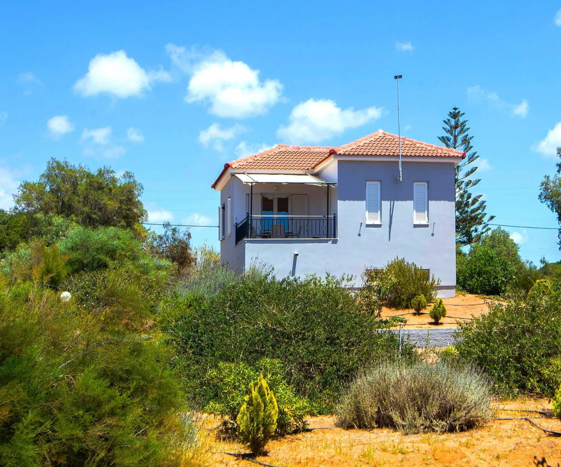 Property building in Romanos Beach Villas
