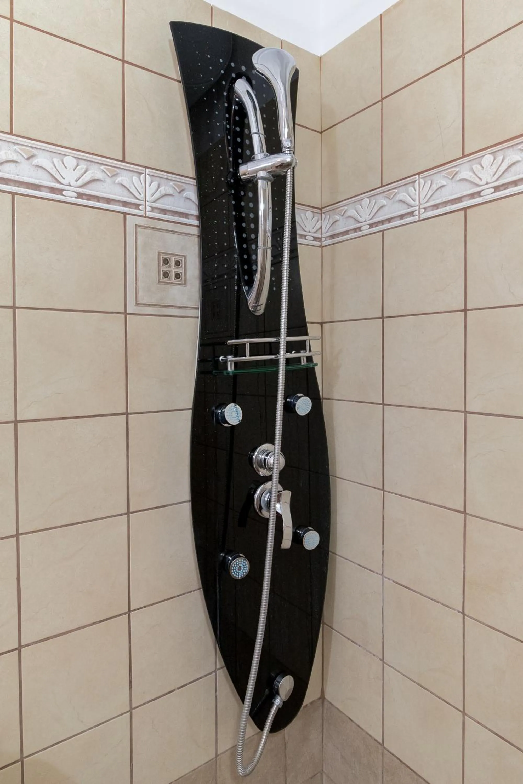 Shower in Romanos Beach Villas