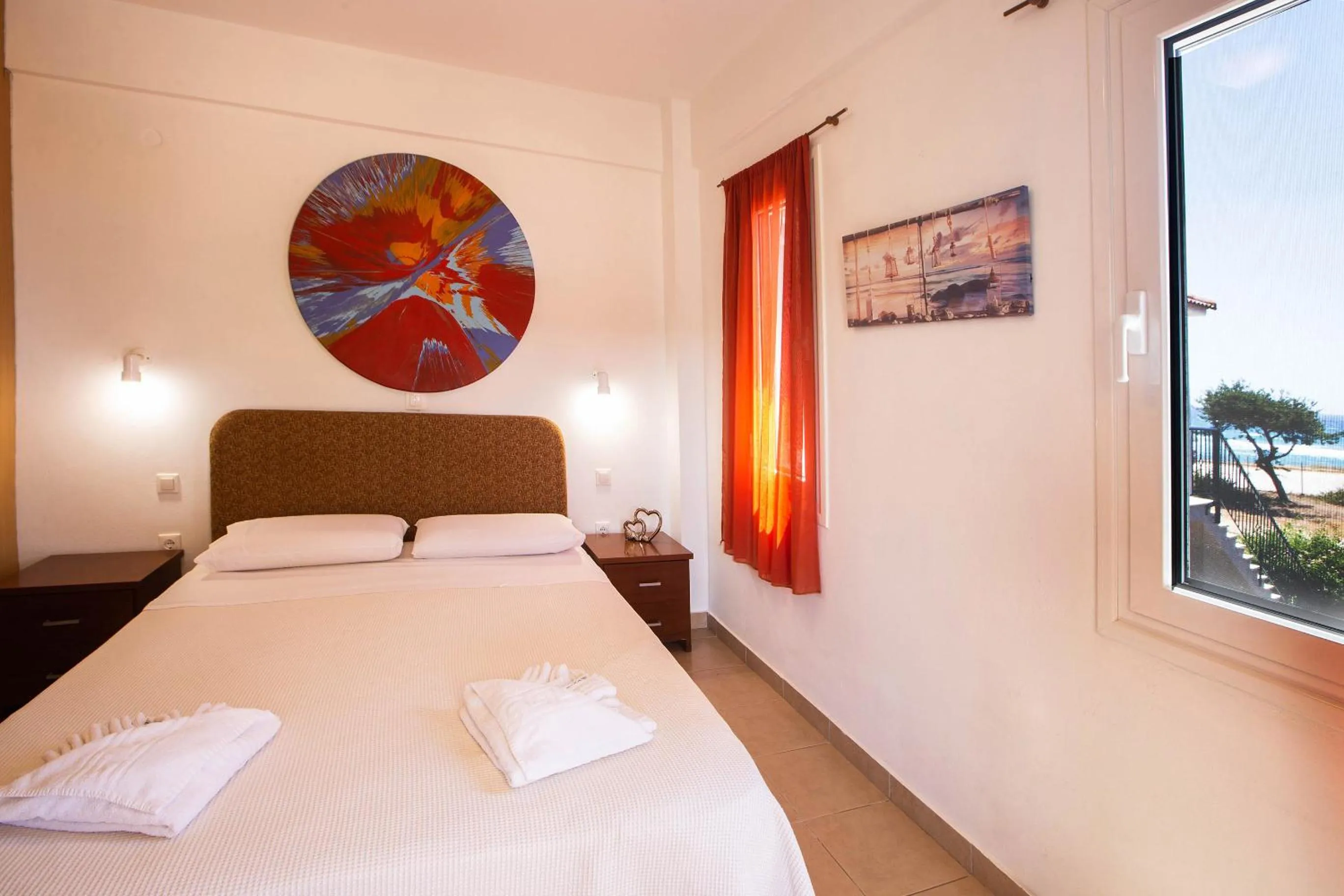 Bed in Romanos Beach Villas