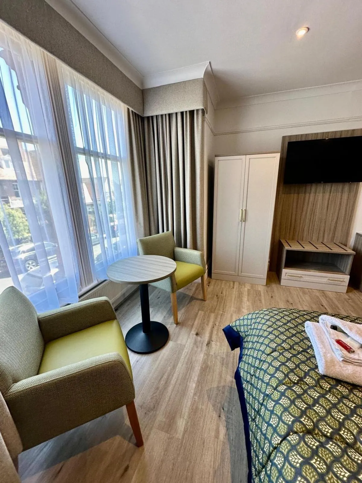 Seating area, Bed in Hotel Coco