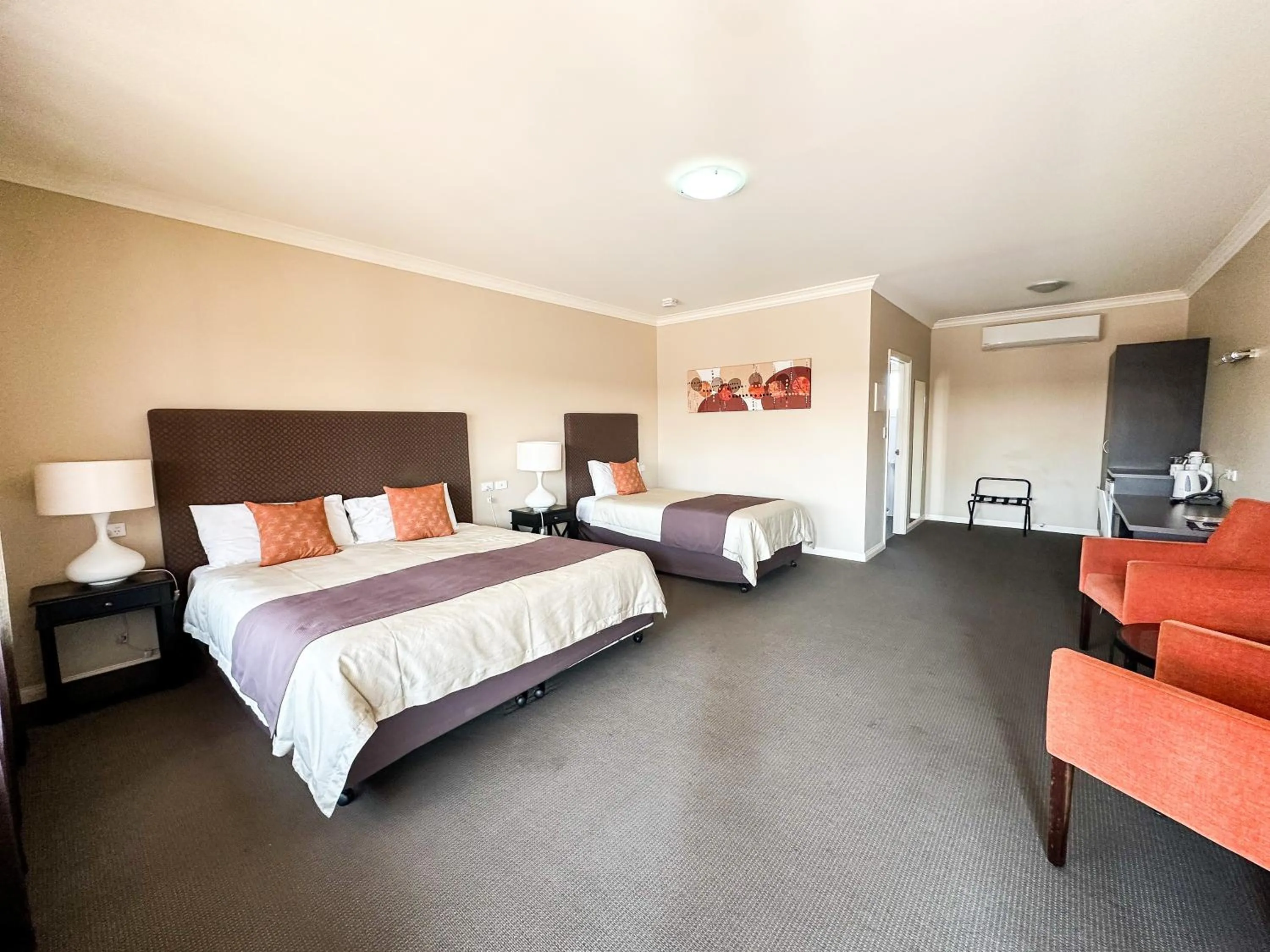 Bed in Sundowner Motel Hotel