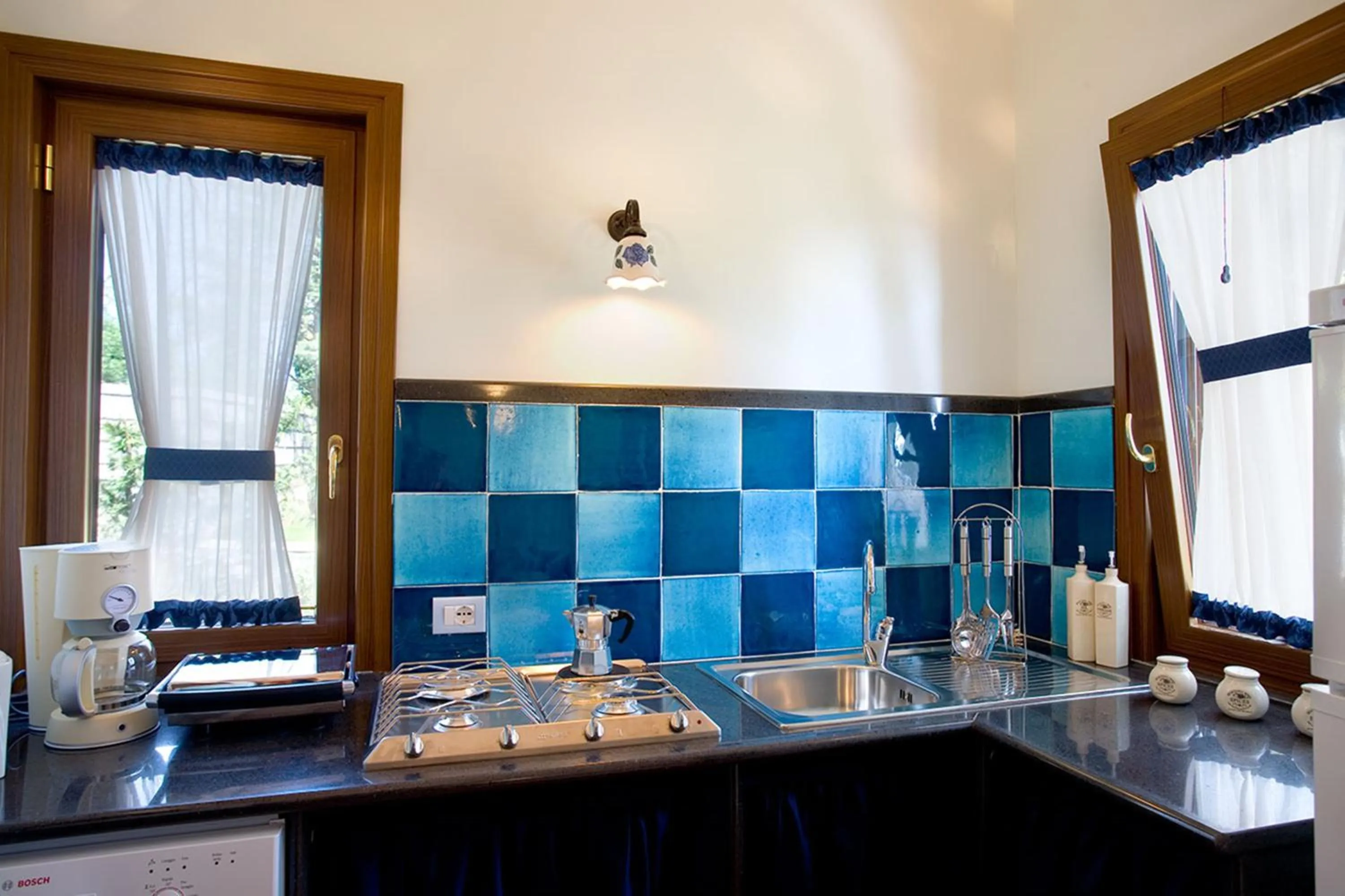 Kitchen or kitchenette in Hotel O Sole Mio