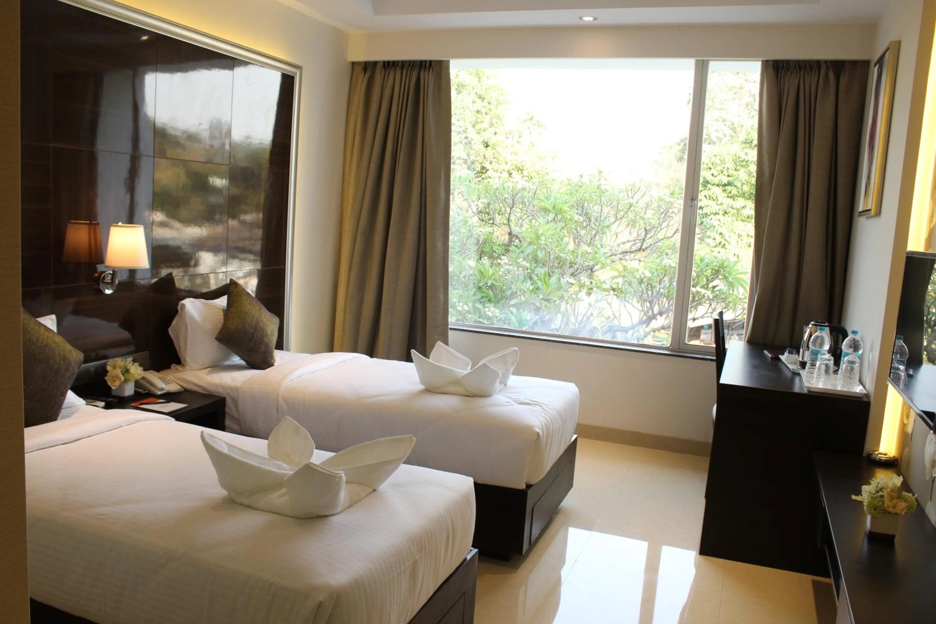 Photo of the whole room, Bed in Hotel Grand Visava Lonavala