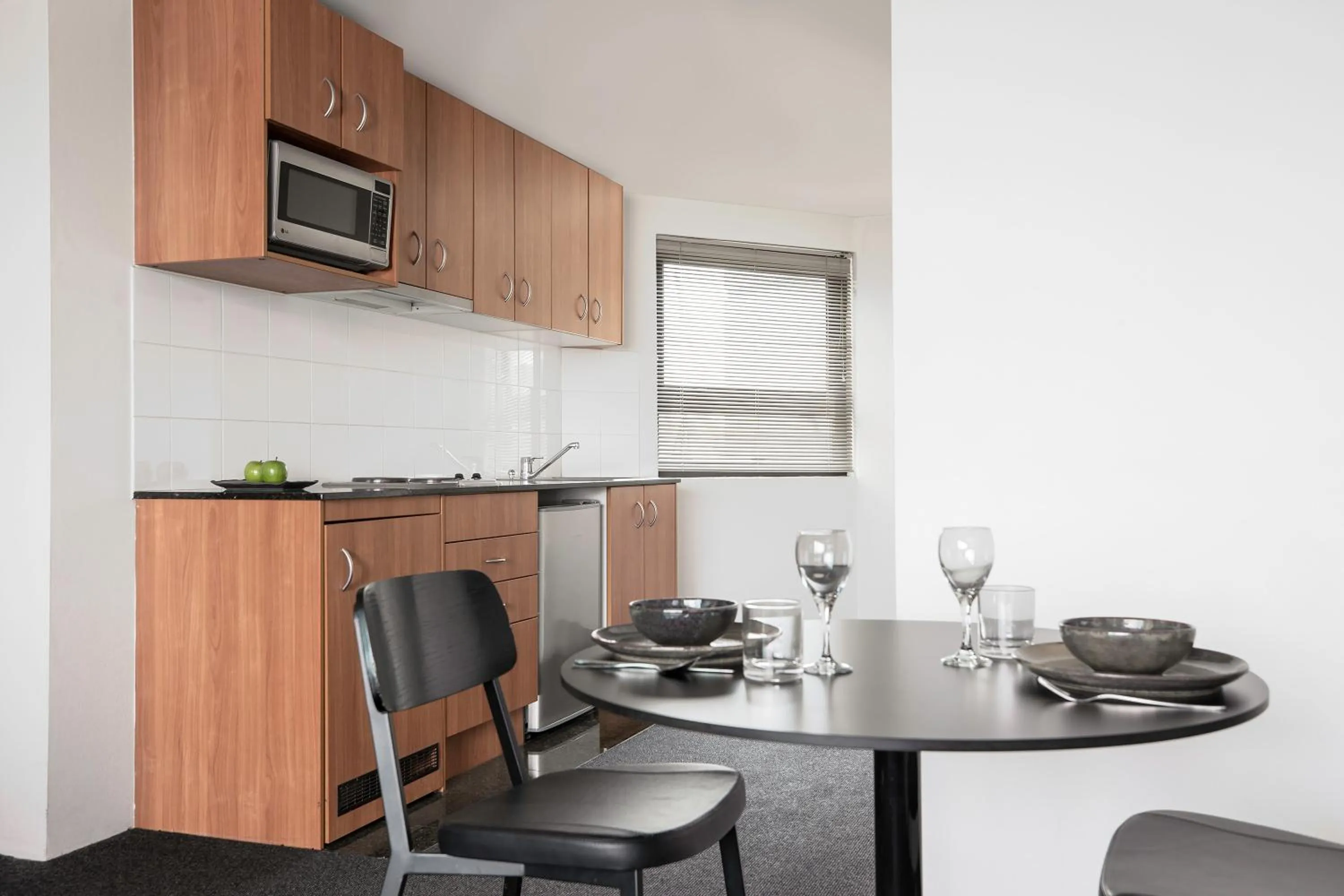 Kitchen or kitchenette in Mantra Parramatta