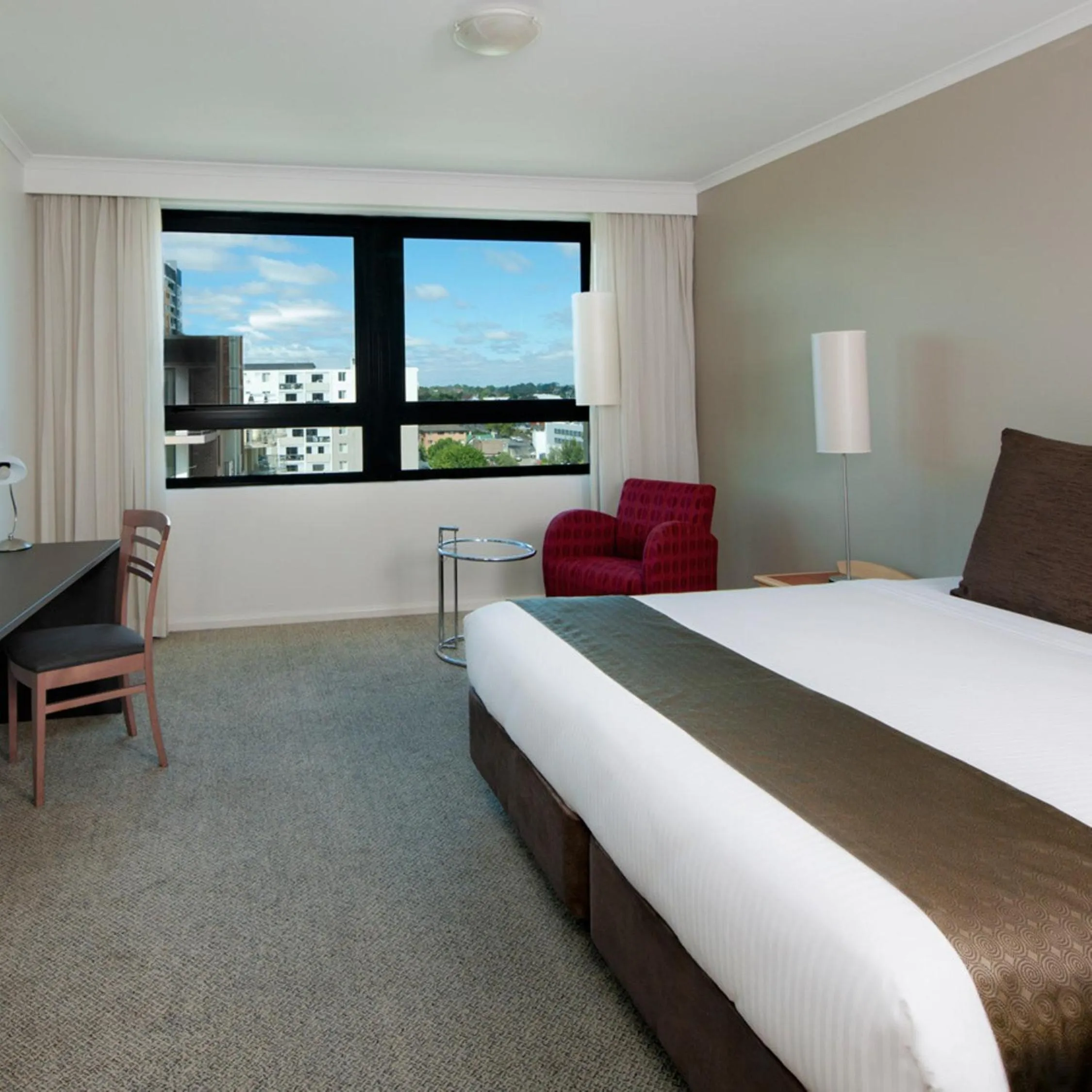 Photo of the whole room, Bed in Mantra Parramatta