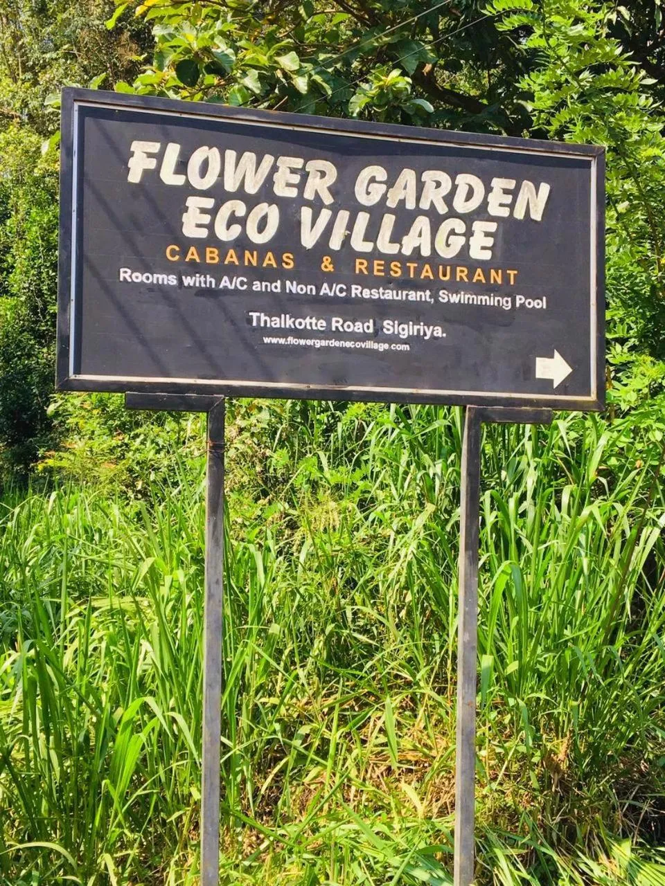 Property logo or sign in Flower Garden Eco Village