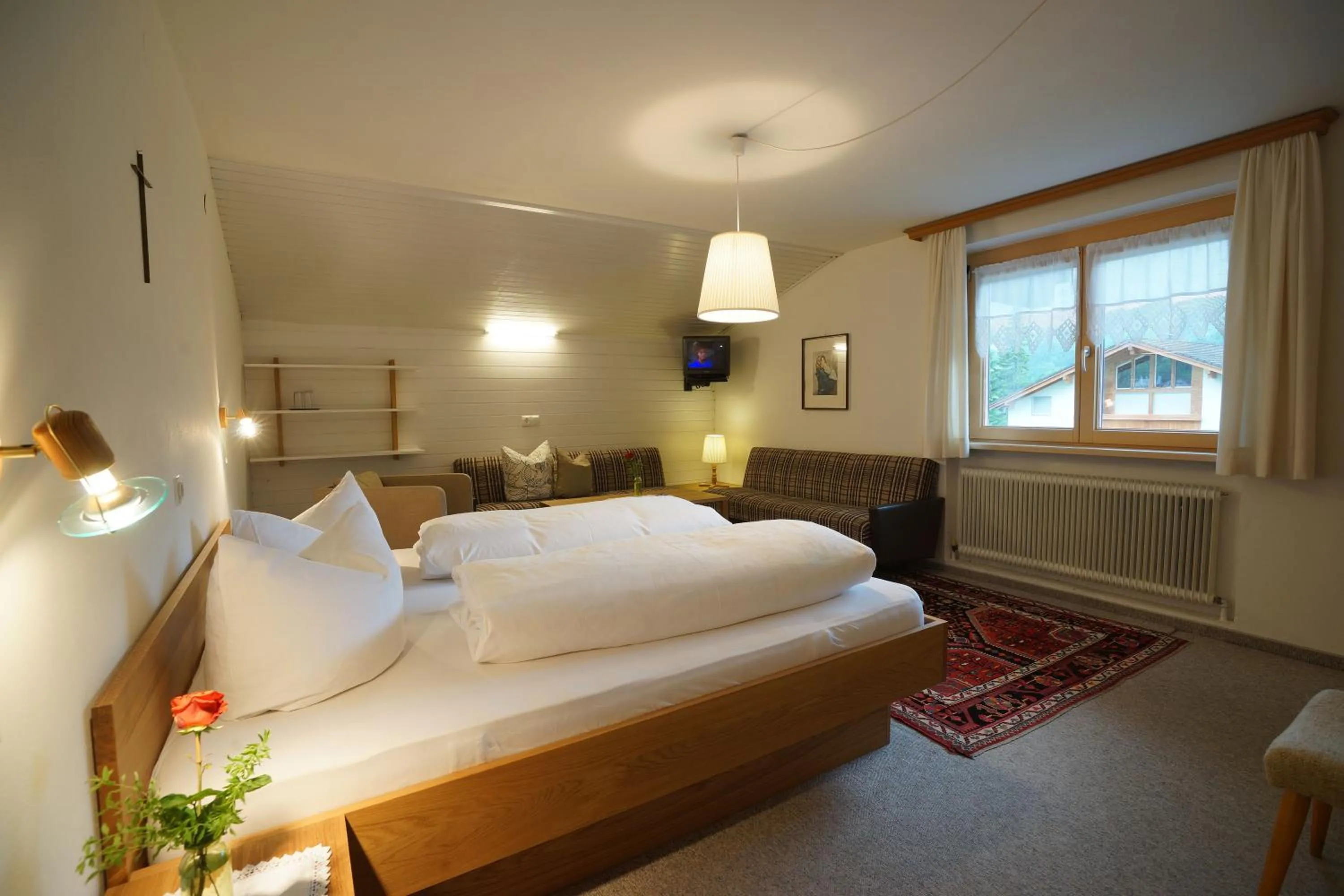 Photo of the whole room, Bed in Gästehaus Meusburger