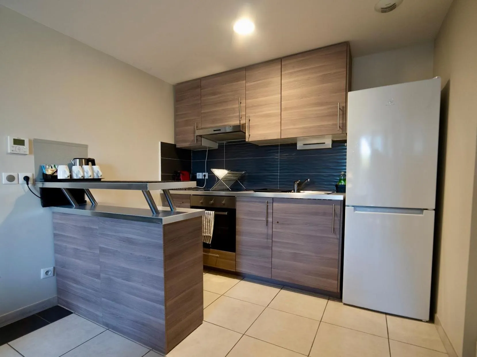 kitchen in Best Western Hotelio Montpellier Sud