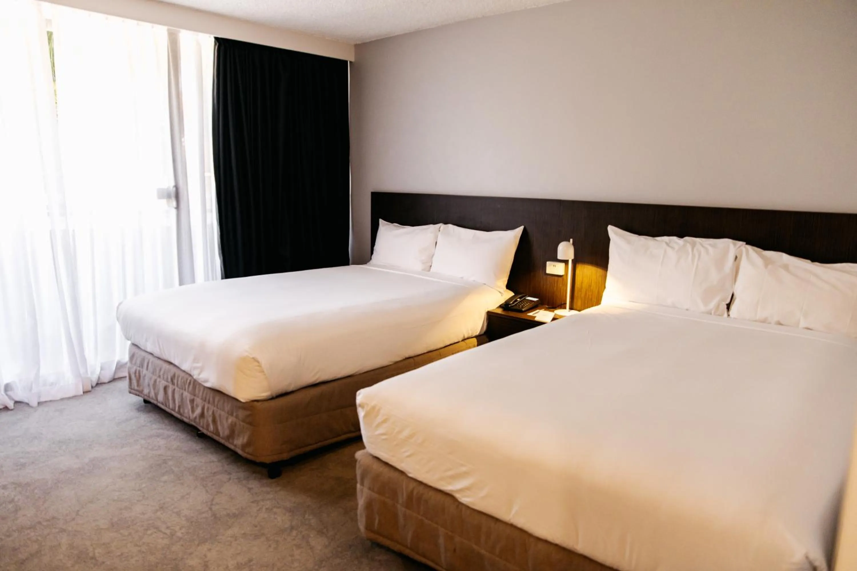 Bed in Mercure Brisbane Spring Hill