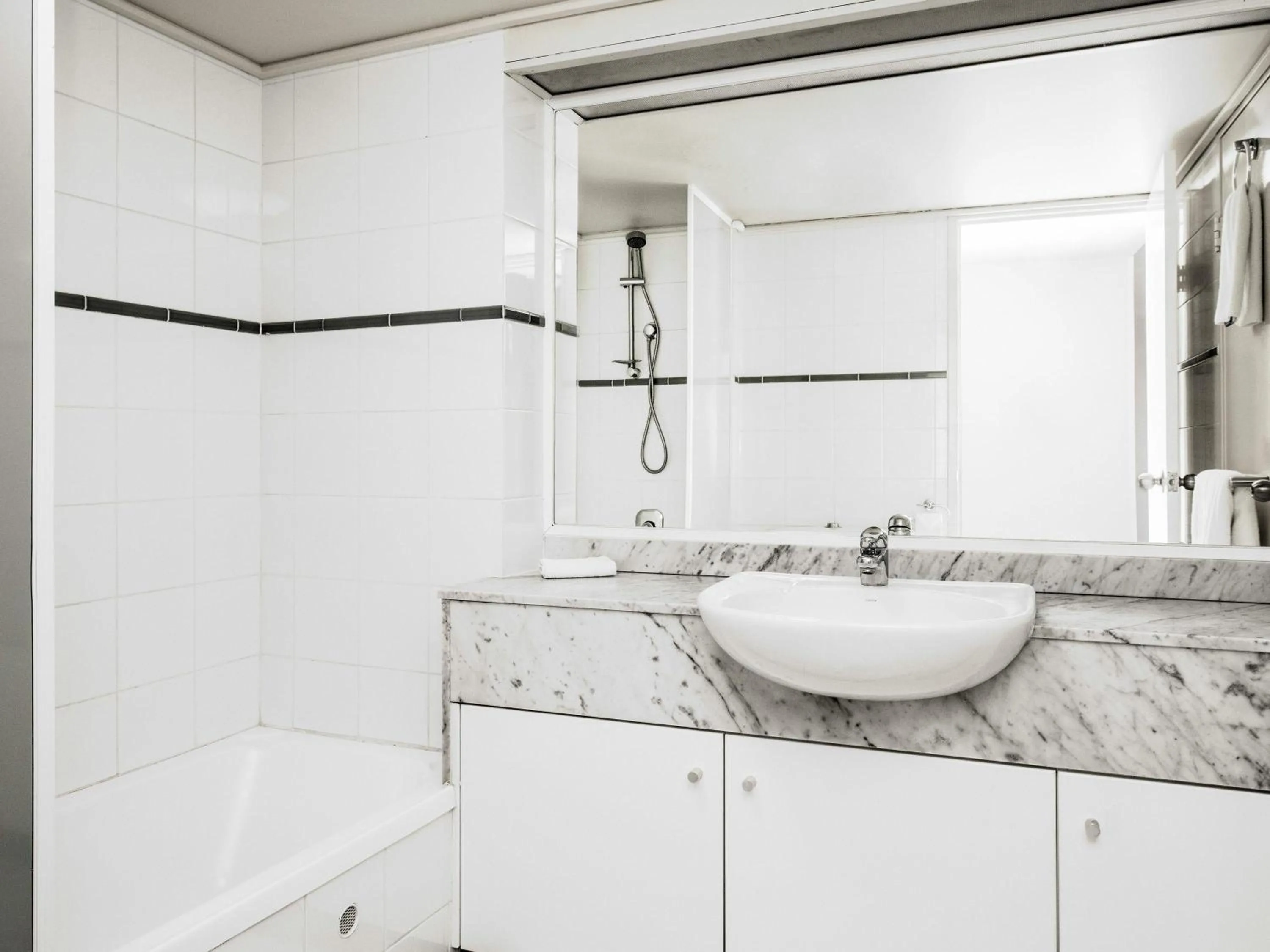 Bedroom in BreakFree Capital Tower Apartments