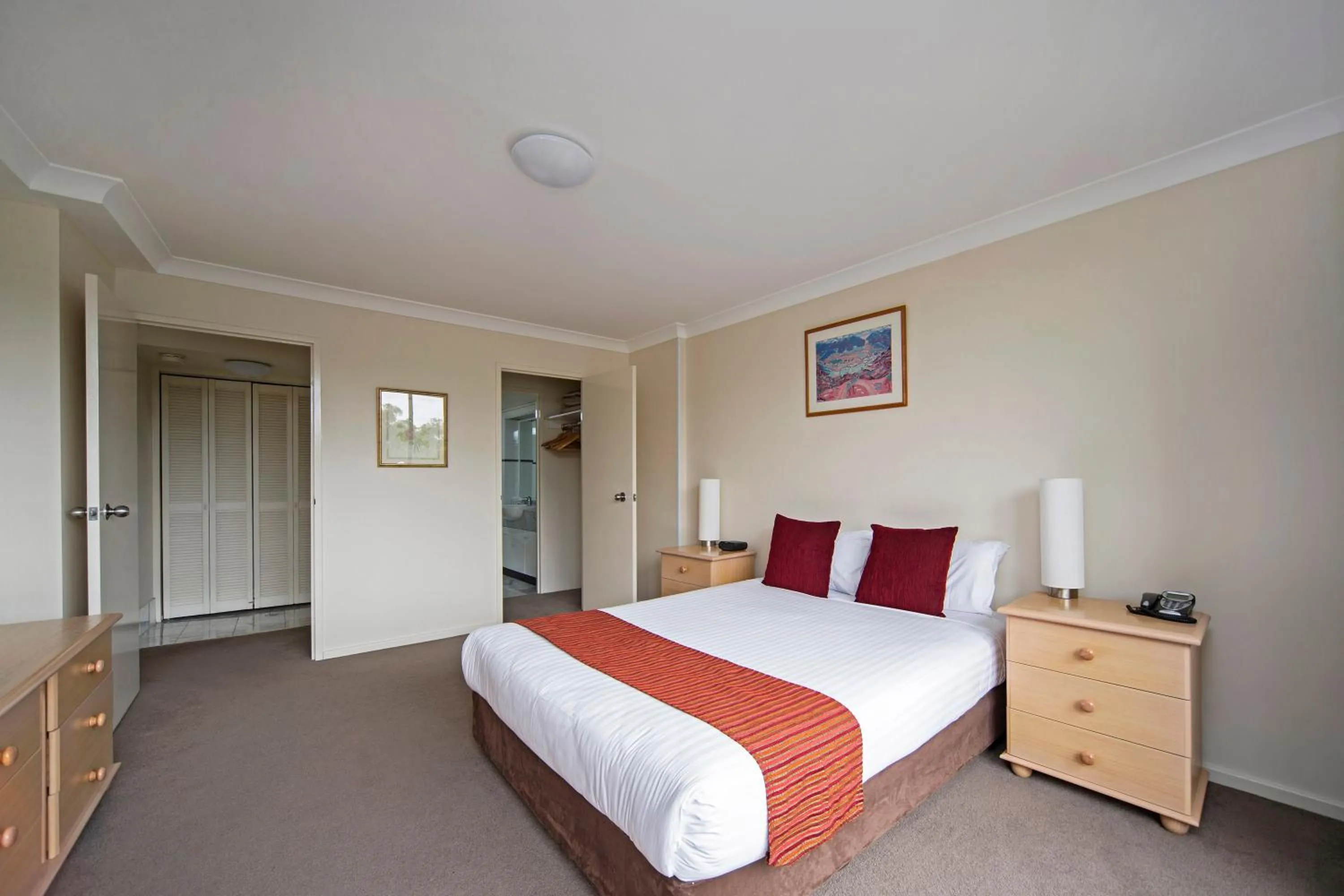 Bedroom, Bed in BreakFree Capital Tower Apartments