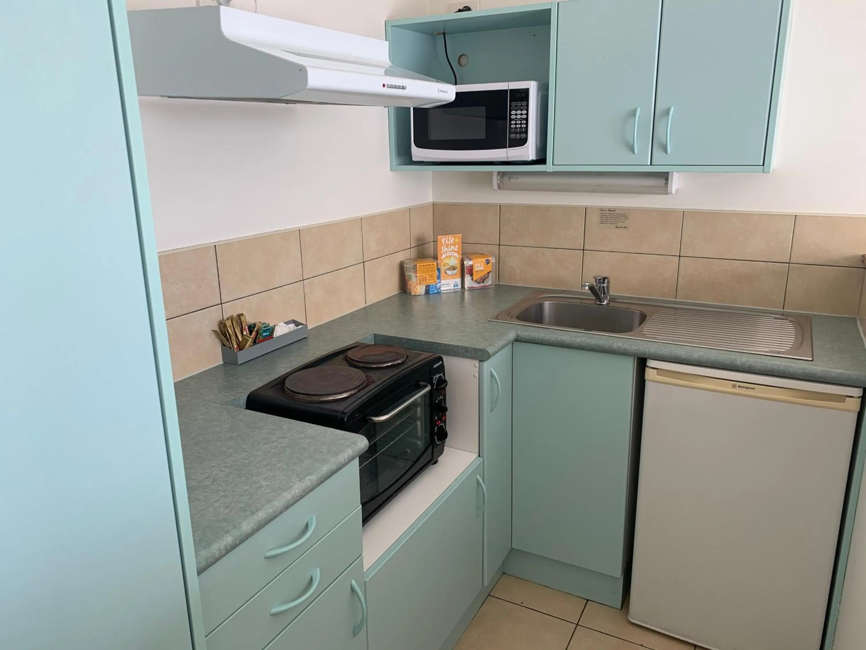 Kitchen or kitchenette in Adina Place Motel Apartments