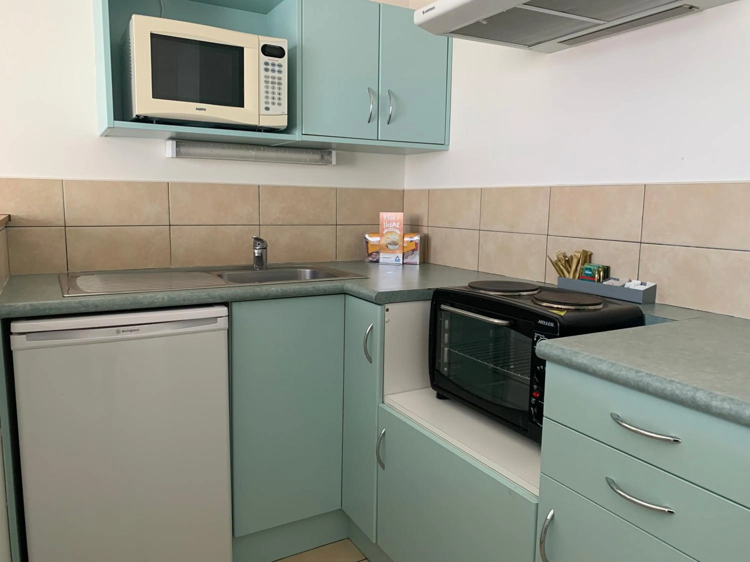 Kitchen or kitchenette in Adina Place Motel Apartments